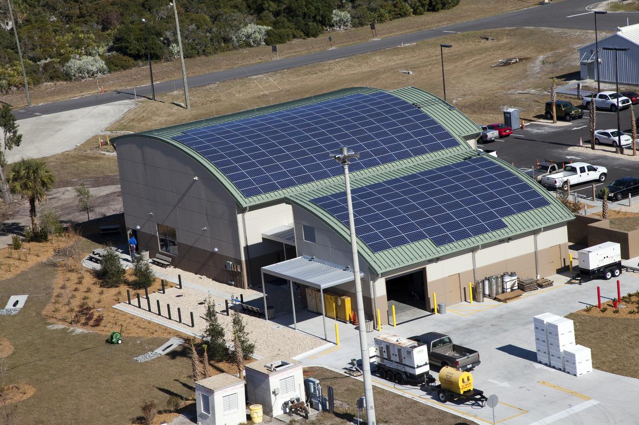 CAPE CANAVERAL, Fla. -- The Propellants North Administrative and Maintenance Facility in the Launch Complex 39 area of NASA's Kennedy Space Center in Florida is ready for business. The environmentally friendly facility is slated to be NASA's second Platinum-rated by the U.S. Green Building Council's (USGBC) Leadership in Environmental and Energy Design (LEED) certification system. It will be the space agency's first carbon-neutral facility, which means it will produce enough energy onsite from renewable sources to offset what it requires to operate. The facility consists of a two-story administrative building, which will house managers, mechanics and technicians who fuel spacecraft at Kennedy, and a single-story shop that will be used to store cryogenic fuel transfer equipment. Photo credit: NASA/Frank Michaux