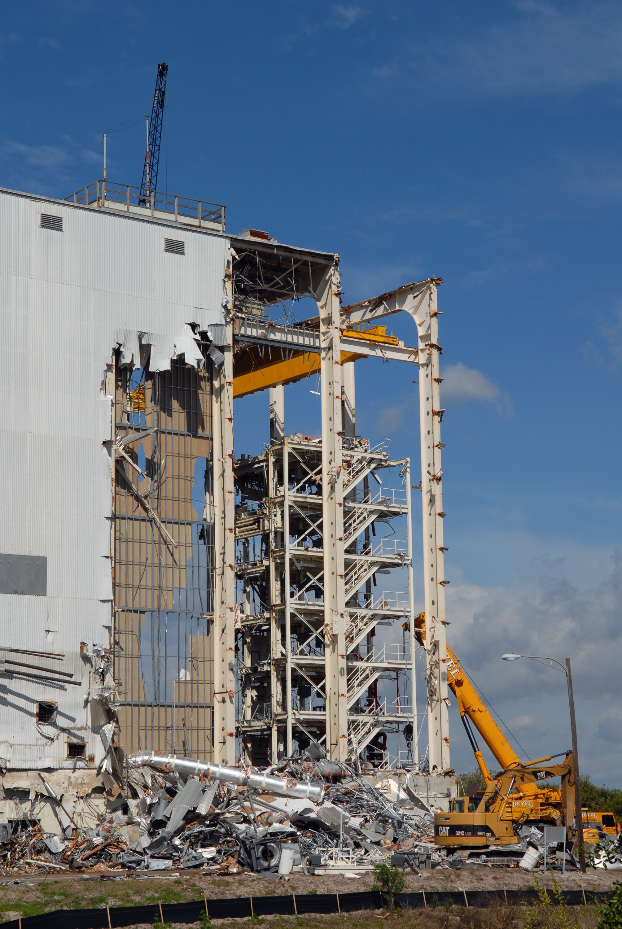 CAPE CANAVERAL, Fla. -- At NASA's Kennedy Space Center in Florida, workers demolish the Vertical Processing Facility, or VPF. The demolition, which started in February and is about half done, is scheduled to be finished by July. About 90 percent of the debris will be recycled. Photo credit: NASA/Jim Grossmann