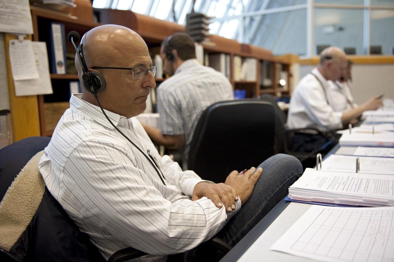 CAPE CANAVERAL, Fla. -- In the Launch Control Center at NASA's Kennedy Space Center in Florida, Assistant Launch Orbiter Test Conductor Mark Taffet sits at his console in Firing Room 4 along with other STS-133 launch team members to rehearse procedures for the liftoff of space shuttle Discovery's final mission. The team at Kennedy also participated in launch simulations with personnel at NASA's Johnson Space Center in Houston. Discovery's next launch opportunity to the International Space Station on the STS-133 mission is planned for no earlier than Feb. 24. For more information on STS-133, visit www.nasa.gov/mission_pages/shuttle/shuttlemissions/sts133/. Photo credit: NASA/Kim Shiflett
