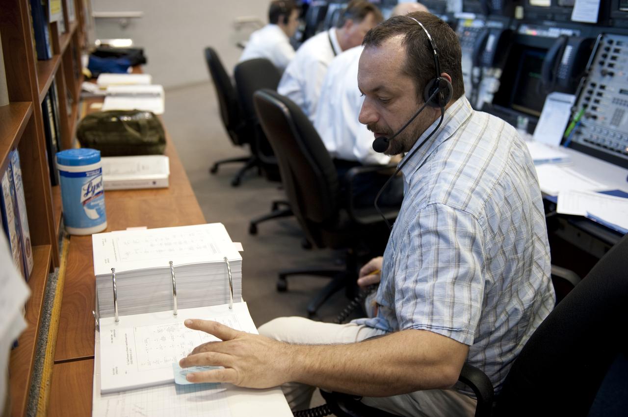 CAPE CANAVERAL, Fla. -- In the Launch Control Center at NASA's Kennedy Space Center in Florida, Launch Orbiter Test Conductor John Kracsun sits at his console in Firing Room 4 along with other STS-133 launch team members to rehearse procedures for the liftoff of space shuttle Discovery's final mission. The team at Kennedy also participated in launch simulations with personnel at NASA's Johnson Space Center in Houston. Discovery's next launch opportunity to the International Space Station on the STS-133 mission is planned for no earlier than Feb. 24. For more information on STS-133, visit www.nasa.gov/mission_pages/shuttle/shuttlemissions/sts133/. Photo credit: NASA/Kim Shiflett