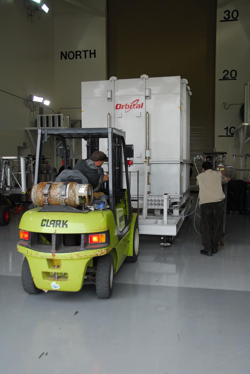 VANDENBERG AIR FORCE BASE, Calif. – The latest Earth-observing satellite developed by NASA, called Glory, is moved into the Astrotech Payload Processing Facility at Vandenberg Air Force Base in California. An Orbital Sciences Taurus XL rocket is targeted to launch Glory into low Earth orbit Feb. 23 from Vandenberg's Space Launch Complex 576-E.         Once in orbit, Glory will collect data on the properties of aerosols and black carbon. It also will help scientists understand how the sun's irradiance affects Earth's climate. Photo credit: NASA/Ed Henry, VAFB
