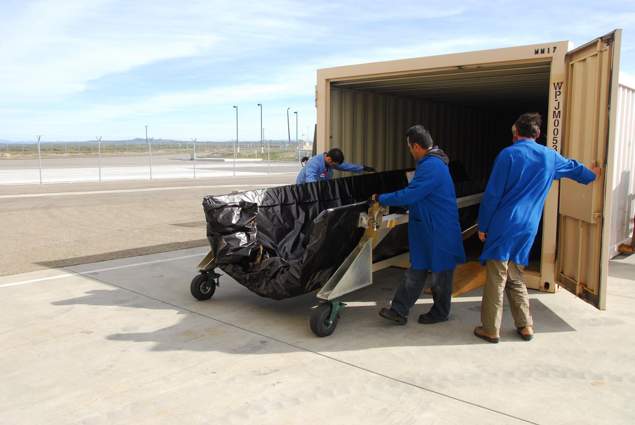 VANDENBERG AIR FORCE BASE, Calif. -- At Vandenberg Air Force Base in California, the protective payload fairing that will surround NASA's Glory spacecraft arrives at the Astrotech payload processing facility. Once encapsulated, the spacecraft will be transported to Space Launch Complex 576-E and joined with the Taurus XL rocket's third stage.           Once Glory reaches orbit, it will collect data on the properties of aerosols and black carbon. It also will help scientists understand how the sun's irradiance affects Earth's climate. Launch is scheduled for 5:09 a.m. EST Feb. 23. For information, visit www.nasa.gov/glory. Photo credit: NASA/Ed Henry, VAFB