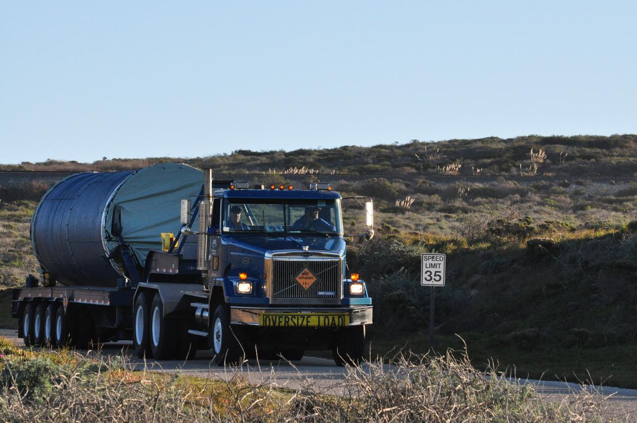 VANDENBERG AIR FORCE BASE, Calif. -- The Stage 0 motor of the Orbital Sciences Corp. Taurus XL rocket makes its journey from Building 1555 to Space Launch Complex 576-E at Vandenberg Air Force Base in California. As part of the four-stage Taurus XL rocket that will carry NASA's Glory spacecraft into low Earth orbit, stages 1, 2 and 3 will join Stage 0 at the launch pad about a week later.     Once Glory reaches orbit, it will collect data on the properties of aerosols and black carbon. It also will help scientists understand how the sun's irradiance affects Earth's climate. Launch is scheduled for 5:09 a.m. EST Feb. 23. For information, visit www.nasa.gov/glory. Photo credit: NASA/Randy Beaudoin, VAFB