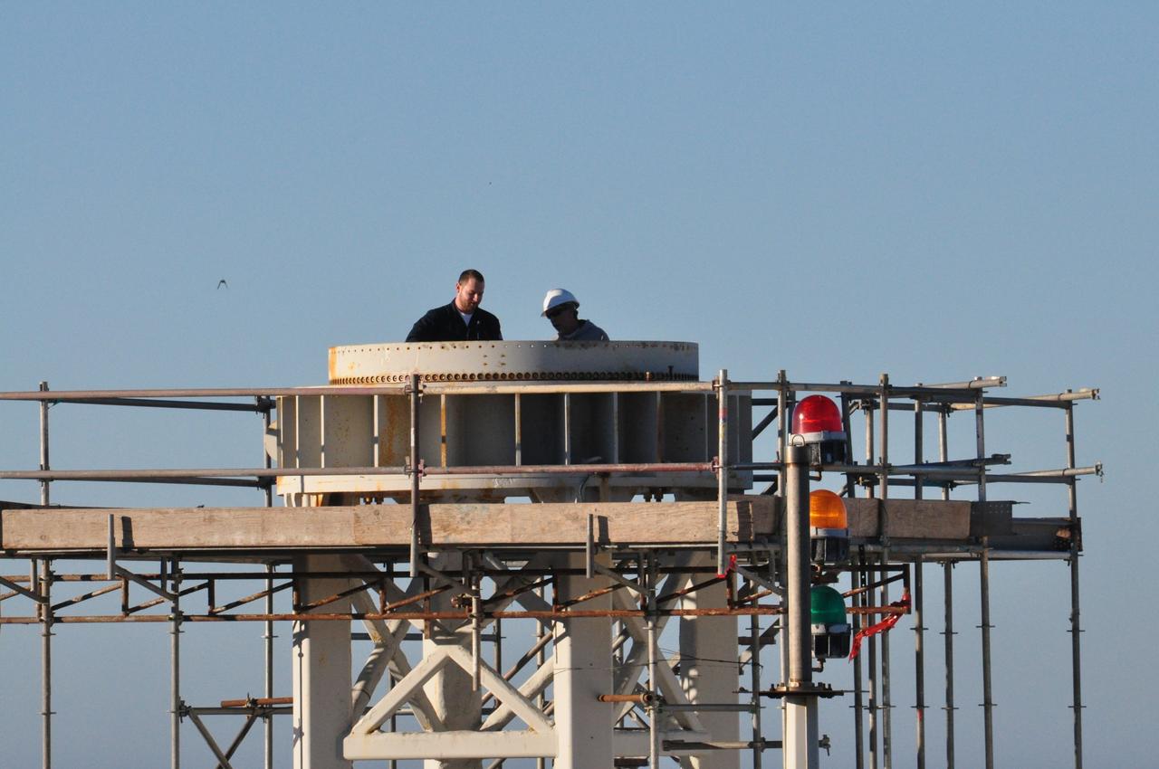VANDENBERG AIR FORCE BASE, Calif. -- Workers on Space Launch Complex 576-E at Vandenberg Air Force Base in California prepare for the arrival of the Stage 0 motor of the Orbital Sciences Corp. Taurus XL rocket. Once at the pad, Stage 0 will be hoisted into its launch position. As part of the four-stage Taurus XL rocket that will carry NASA's Glory spacecraft into low Earth orbit, stages 1, 2 and 3 will join Stage 0 at the launch pad about a week later.             Once Glory reaches orbit, it will collect data on the properties of aerosols and black carbon. It also will help scientists understand how the sun's irradiance affects Earth's climate. Launch is scheduled for 5:09 a.m. EST Feb. 23. For information, visit www.nasa.gov/glory. Photo credit: NASA/Randy Beaudoin, VAFB