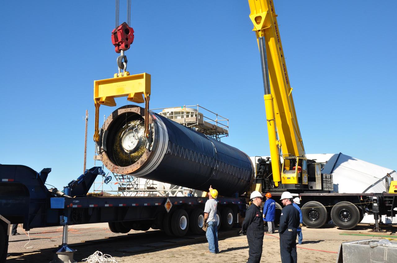 VANDENBERG AIR FORCE BASE, Calif. -- The Stage 0 motor of the Orbital Sciences Corp. Taurus XL is hoisted into launch position by crane at Space Launch Complex 576-E at Vandenberg Air Force Base in California. As part of the four-stage Taurus XL rocket that will carry NASA's Glory spacecraft into low Earth orbit, stages 1, 2 and 3 will join Stage 0 at the launch pad about a week later.          Once Glory reaches orbit, it will collect data on the properties of aerosols and black carbon. It also will help scientists understand how the sun's irradiance affects Earth's climate. Launch is scheduled for 5:09 a.m. EST Feb. 23. For information, visit www.nasa.gov/glory. Photo credit: NASA/Randy Beaudoin, VAFB