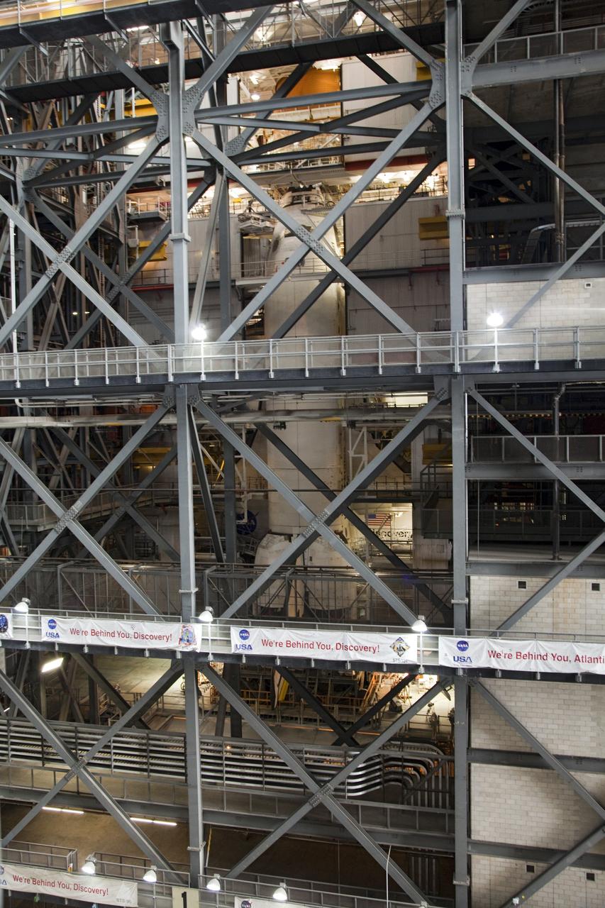 CAPE CANAVERAL, Fla. -- Repair work to space shuttle Discovery's external fuel tank continues in the Vehicle Assembly Building at NASA's Kennedy Space Center in Florida. Technicians are modifying 94 support beams, called stringers, on the tank's intertank region by fitting pieces of metal, called radius blocks, over the stringers' edges. After modifications to the stringers are complete, foam insulation will be re-applied to the tank. Discovery's next launch opportunity to the International Space Station on the STS-133 mission is targeted for Feb. 24. For more information on STS-133, visit www.nasa.gov/mission_pages/shuttle/shuttlemissions/sts133/. Photo credit: NASA/Frank Michaux