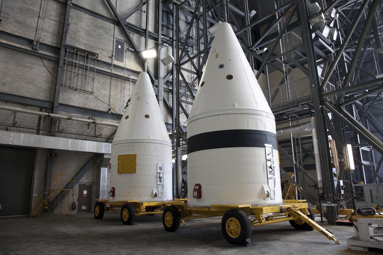 CAPE CANAVERAL, Fla. -- At NASA's Kennedy Space Center in Florida, the Space Shuttle Program's final solid rocket booster assembly is stationed in the transfer aisle of the Vehicle Assembly Building. The right and left forward assemblies, which were refurbished and processed at Kennedy, are comprised of three components -- nose cap, frustum and forward skirt. Inside the Vehicle Assembly Building, the boosters will be stacked and then joined to an external fuel tank and space shuttle Atlantis for the STS-135 mission to the International Space Station. STS-135 is targeted to launch June 28, and will be the last spaceflight for the Space Shuttle Program. Photo credit: NASA/Frank Michaux