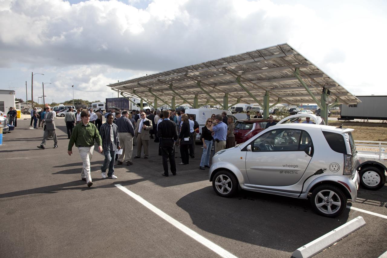 CAPE CANAVERAL, Fla. -- NASA's Kennedy Space Center in Florida hosts a ribbon-cutting ceremony for its new environmentally friendly Propellants North Administrative and Maintenance Facility. This is a view of the parking lot where a solar-powered charging canopy is available for powering government or privately owned electric vehicles. Propellants North consists of two buildings, one to store cryogenic fuel transfer equipment and one to house personnel who support fueling spacecraft. The recently rebuilt buildings will be NASA's first carbon neutral facility, which means it will produce enough energy on site from renewable sources to offset what it requires to operate. The facility also will reach for the U.S. Green Building Council's Leadership in Environmental and Energy Design (LEED) Platinum status, which is the highest LEED rating. Photo credit: NASA/Frankie Martin