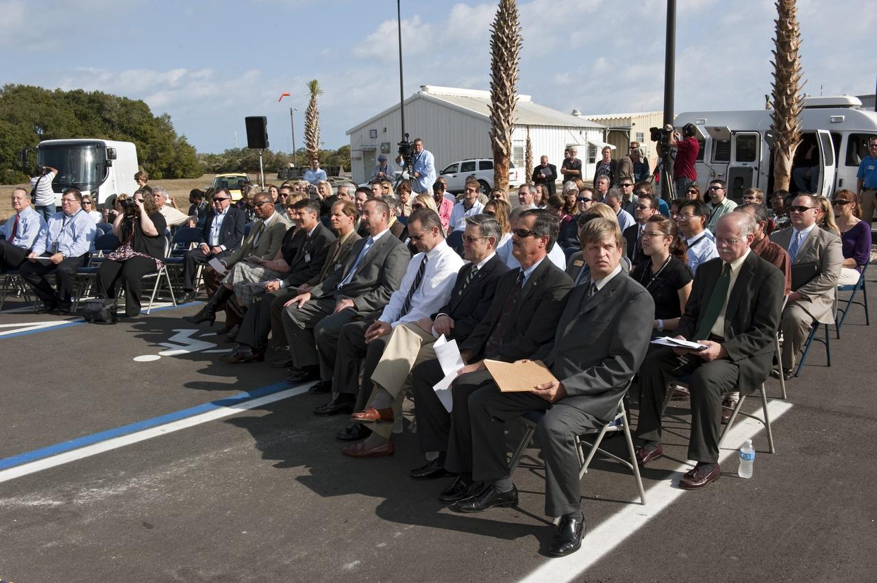CAPE CANAVERAL, Fla. -- At NASA's Kennedy Space Center in Florida, an audience at the ribbon-cutting ceremony for the new environmentally friendly Propellants North Administration and Maintenance Facility listens to opening remarks made by Frank Kline, a NASA Construction of Facilities project manager. Propellants North consists of two buildings, one to store cryogenic fuel transfer equipment and one to house personnel who support fueling spacecraft. The recently rebuilt buildings will be NASA's first carbon neutral facility, which means it will produce enough energy on site from renewable sources to offset what it requires to operate. The facility also will reach for the U.S. Green Building Council's Leadership in Environmental and Energy Design (LEED) Platinum status, which is the highest LEED rating. Photo credit: NASA/Kim Shiflett