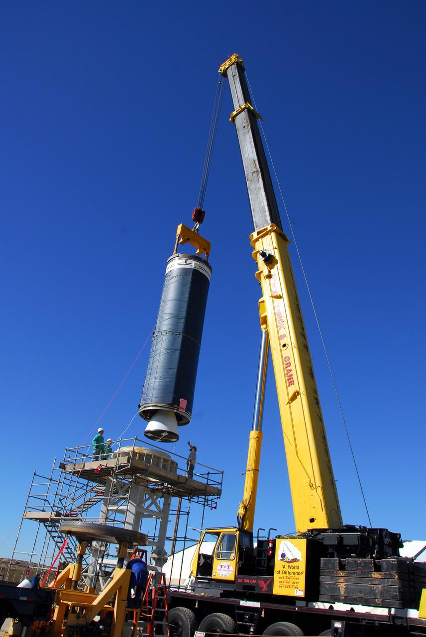 VANDENBERG AIR FORCE BASE, Calif. -- The Stage 0 motor of the Orbital Sciences Corp. Taurus XL is moved into launch position on Space Launch Complex 576-E at Vandenberg Air Force Base in California. As part of the four-stage Taurus XL rocket that will carry NASA's Glory spacecraft into low Earth orbit, stages 1, 2 and 3 will join Stage 0 at the launch pad about a week later.          Once Glory reaches orbit, it will collect data on the properties of aerosols and black carbon. It also will help scientists understand how the sun's irradiance affects Earth's climate. Launch is scheduled for 5:09 a.m. EST Feb. 23. For information, visit www.nasa.gov/glory. Photo credit: NASA/Don Kosoksa, VAFB
