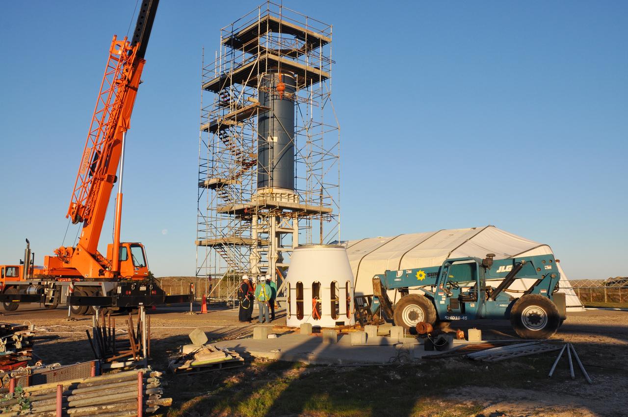 VANDENBERG AIR FORCE BASE, Calif. -- At Vandenberg Air Force Base in California, Stage 0/1 interstage, part of the four-stage Taurus XL rocket that will carry NASA's Glory spacecraft into low Earth orbit, arrives at Space Launch Complex 576-E. Once Glory reaches orbit, it will collect data on the properties of aerosols and black carbon. It also will help scientists understand how the sun's irradiance affects Earth's climate. Launch is scheduled for 5:09 a.m. EST Feb. 23. For information, visit www.nasa.gov/glory. Photo credit: NASA/Randy Beaudoin, VAFB
