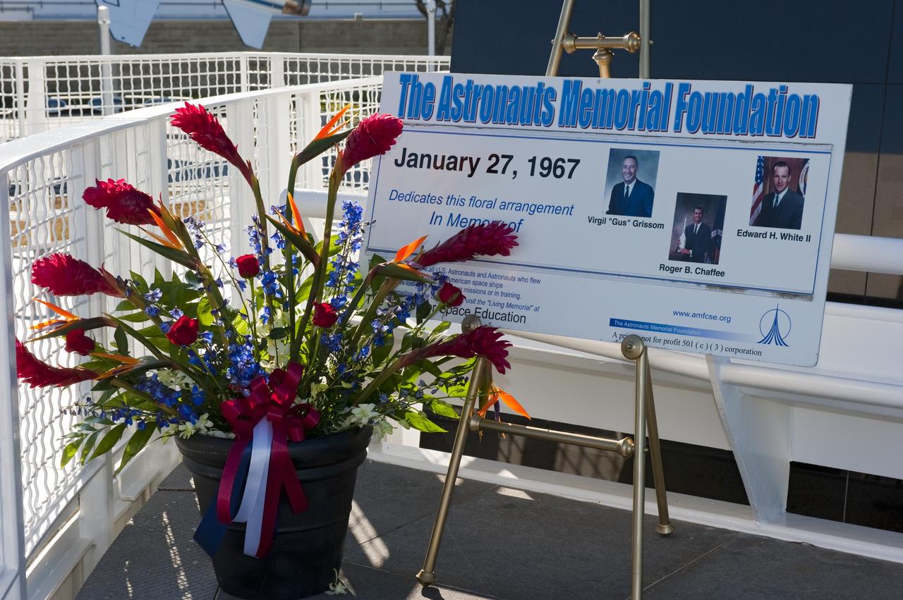 CAPE CANAVERAL, Fla. -- Flowers lay at the foot of the Space Mirror Memorial at the Kennedy Space Center Visitor Complex in Florida before a Day of Remembrance wreath laying ceremony to honor members of the NASA family who lost their lives while furthering the cause of exploration and discovery. The floral arrangement is dedicated to the Apollo 1 crew members Virgil "Gus" Grissom, Roger B. Chaffee and Edward H. White II. The memorial honors 24 United States astronauts, including the crew members of space shuttles Columbia and Challenger, Apollo 1, and those who died in training and commercial airplane accidents.            The memorial is a project of the Astronauts Memorial Foundation and was paid for by Florida residents who purchased special Challenger mission automobile license plates. 2011 marks the 25th anniversary of the loss of Challenger, which broke apart over the Atlantic Ocean 73 seconds into flight on Jan. 28, 1986. Photo credit: NASA/Kim Shiflett