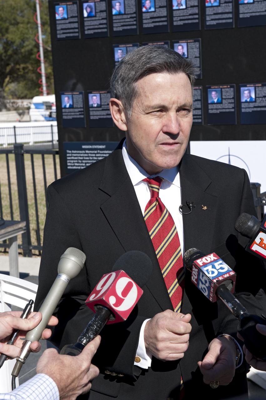 CAPE CANAVERAL, Fla. -- Kennedy Space Center Director and former astronaut Bob Cabana answers media questions during a Day of Remembrance wreath laying ceremony at the Space Mirror Memorial at the Kennedy Space Center Visitor Complex in Florida. The ceremony honors members of the NASA family who lost their lives while furthering the cause of exploration and discovery. The memorial displays the names of 24 United States astronauts, including the crew members of space shuttles Columbia and Challenger, Apollo 1, and those who died in training and commercial airplane accidents.                     The memorial is a project of the Astronauts Memorial Foundation and was paid for by Florida residents who purchased special Challenger mission automobile license plates. 2011 marks the 25th anniversary of the loss of Challenger, which broke apart over the Atlantic Ocean 73 seconds into flight on Jan. 28, 1986. Photo credit: NASA/Kim Shiflett