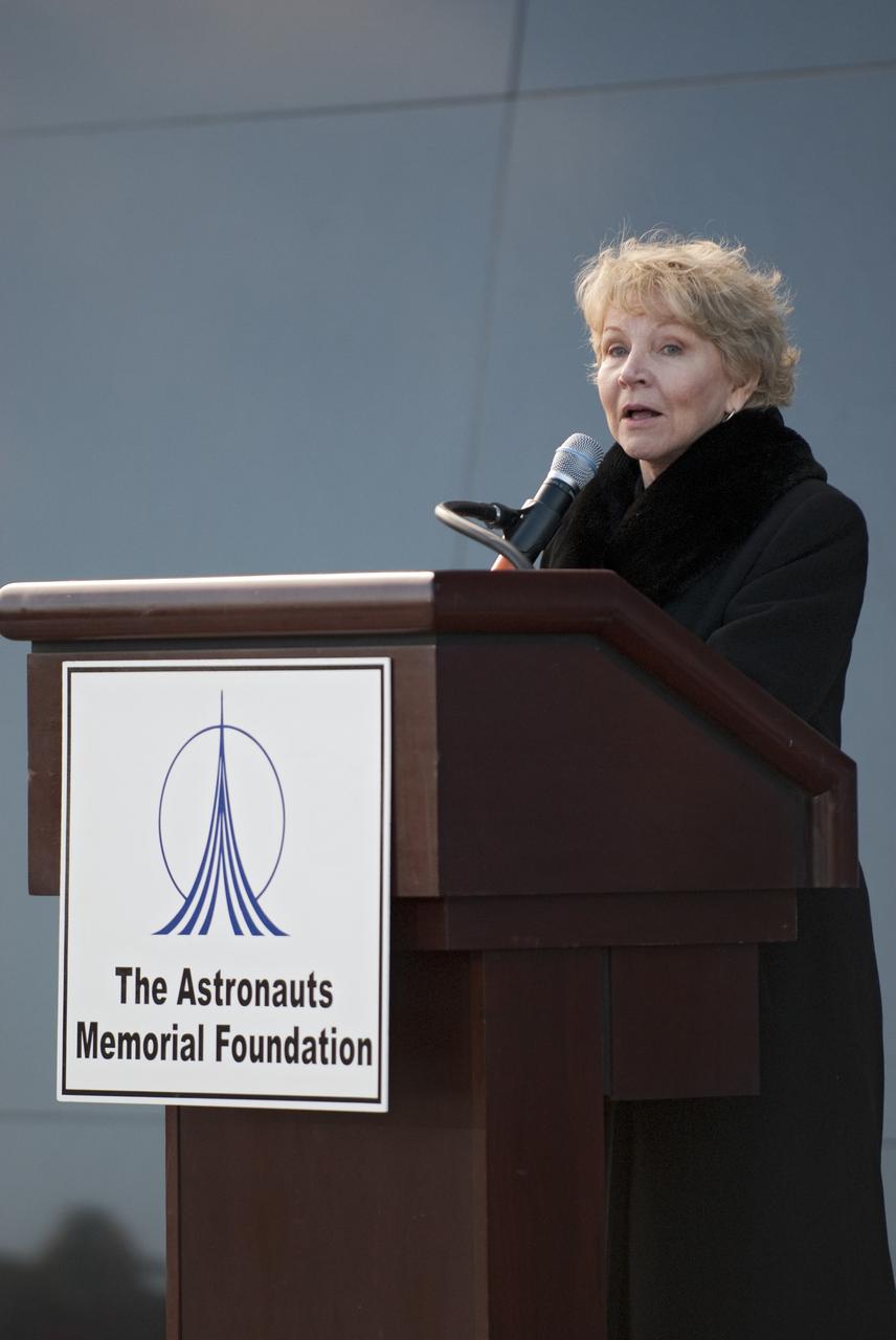 CAPE CANAVERAL, Fla. -- Dr. June Scobee Rodgers, the founding chair of the Challenger Center for Space Science Education and widow of space shuttle Challenger's STS-51L Commander Dick Scobee, speaks to a crowd gathered in front of the Space Mirror Memorial at the Kennedy Space Center Visitor Complex in Florida to honor the Challenger crew members who gave their lives for while furthering the cause of exploration and discovery. 2011 marks the 25th anniversary of the loss of Challenger, which broke apart over the Atlantic Ocean 73 seconds into flight on Jan. 28, 1986.         Photo credit: NASA/Kim Shiflett