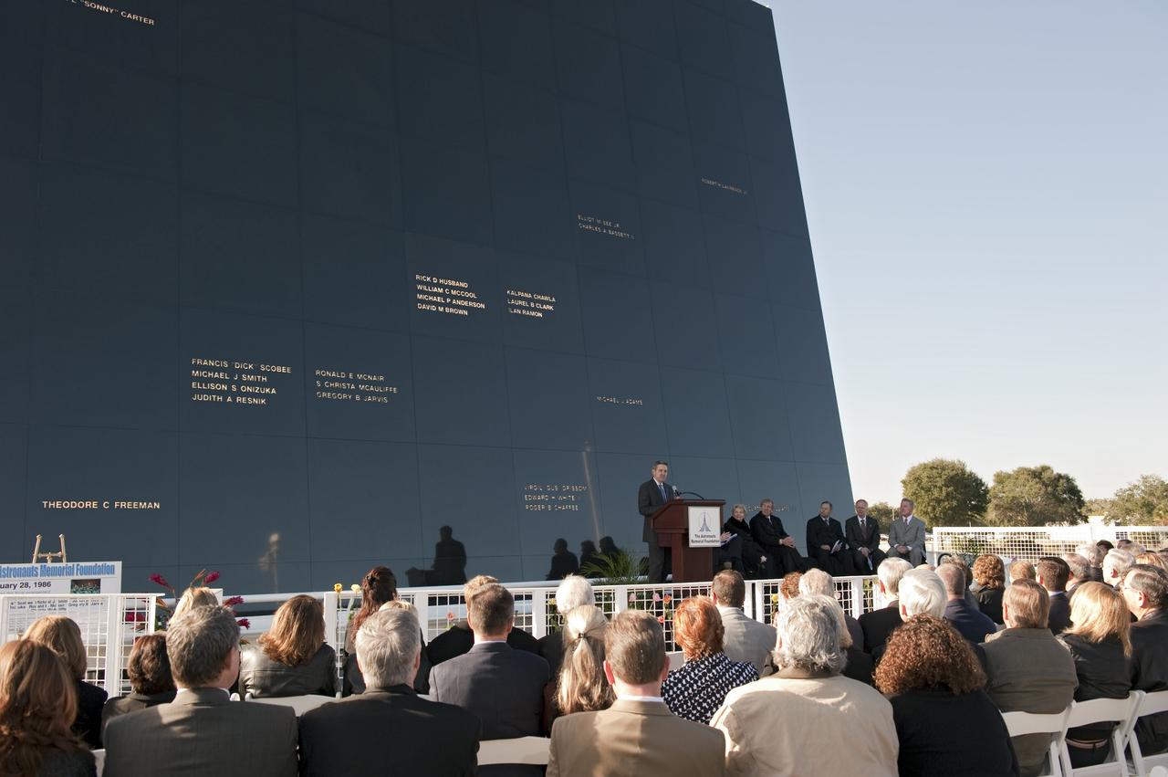 CAPE CANAVERAL, Fla. -- Former astronaut and NASA Kennedy Space Center Director Bob Cabana speaks to a crowd gathered in front of the Space Mirror Memorial at the Kennedy Space Center Visitor Complex in Florida to honor space shuttle Challenger's STS-51L crew members who gave their lives for while furthering the cause of exploration and discovery. 2011 marks the 25th anniversary of the loss of Challenger, which broke apart over the Atlantic Ocean 73 seconds into flight on Jan. 28, 1986.                 Photo credit: NASA/Kim Shiflett