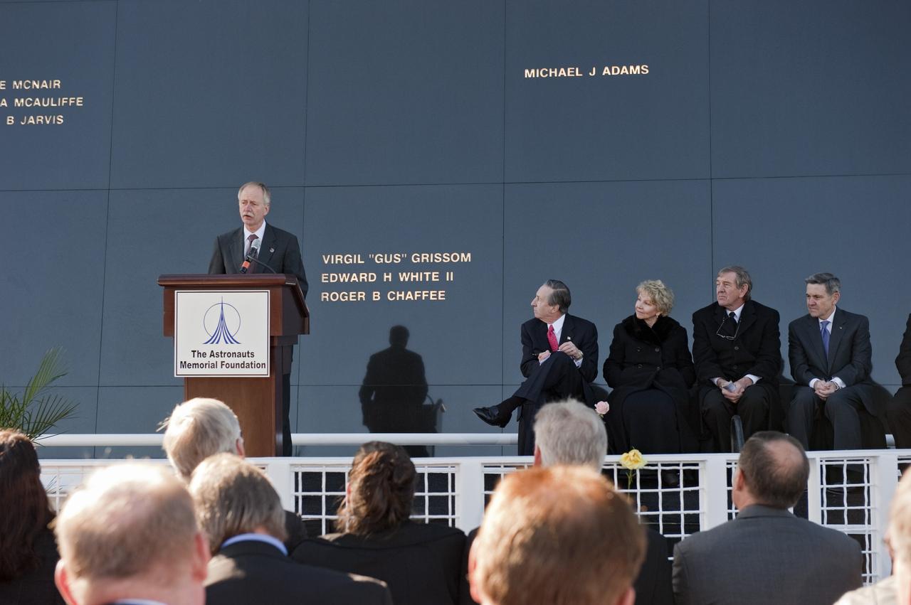 CAPE CANAVERAL, Fla. -- NASA Associate Administrator for Space Operations William Gerstenmaier speaks to a crowd gathered in front of the Space Mirror Memorial at the Kennedy Space Center Visitor Complex in Florida to honor space shuttle Challenger's STS-51L crew members who gave their lives for while furthering the cause of exploration and discovery. 2011 marks the 25th anniversary of the loss of Challenger, which broke apart over the Atlantic Ocean 73 seconds into flight on Jan. 28, 1986.           Photo credit: NASA/Kim Shiflett
