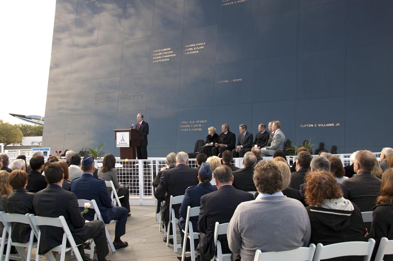 CAPE CANAVERAL, Fla. -- Stephen Feldman, president of the Astronauts Memorial Foundation, speaks to a crowd gathered in front of the Space Mirror Memorial at the Kennedy Space Center Visitor Complex in Florida to honor space shuttle Challenger's STS-51L crew members who gave their lives for while furthering the cause of exploration and discovery. 2011 marks the 25th anniversary of the loss of Challenger, which broke apart over the Atlantic Ocean 73 seconds into flight on Jan. 28, 1986.            NASA/Jack Pfaller