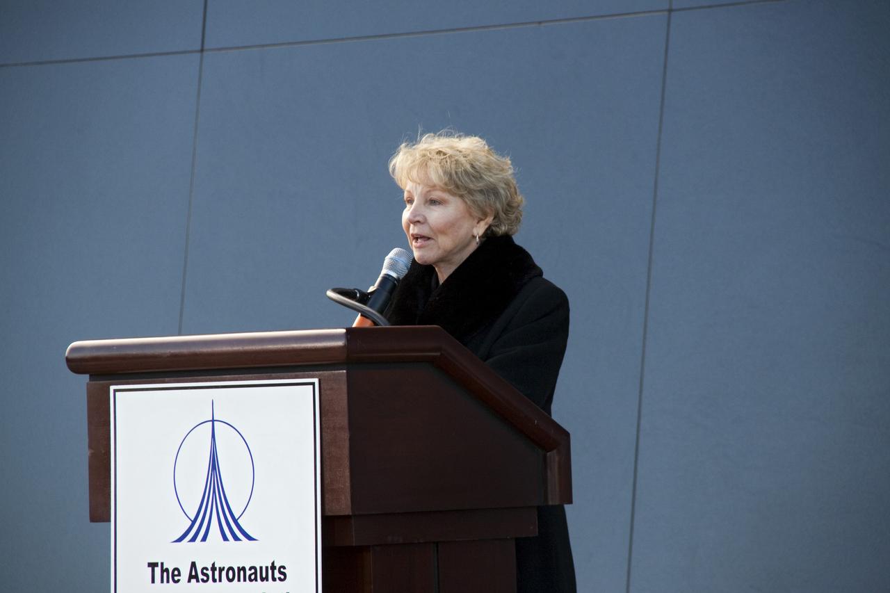 CAPE CANAVERAL, Fla. -- Dr. June Scobee Rodgers, the founding chair of the Challenger Center for Space Science Education and widow of space shuttle Challenger's STS-51L Commander Dick Scobee, speaks to a crowd gathered in front of the Space Mirror Memorial at the Kennedy Space Center Visitor Complex in Florida to honor the Challenger crew members who gave their lives for while furthering the cause of exploration and discovery. 2011 marks the 25th anniversary of the loss of Challenger, which broke apart over the Atlantic Ocean 73 seconds into flight on Jan. 28, 1986.        NASA/Jack Pfaller