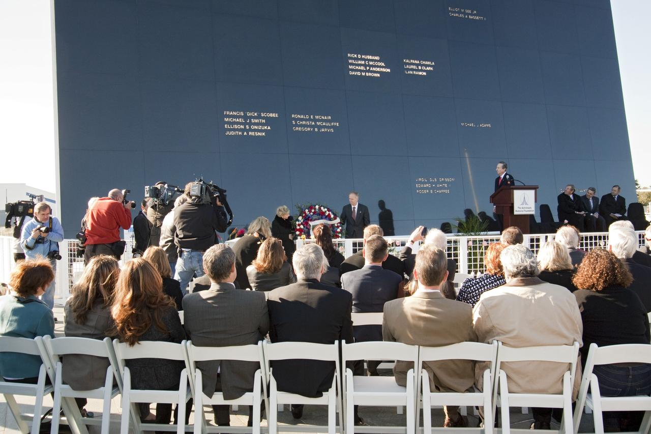 CAPE CANAVERAL, Fla. -- Dr. June Scobee Rodgers, the founding chair of the Challenger Center for Space Science Education and widow of space shuttle Challenger's STS-51L Commander Dick Scobee, and NASA Associate Administrator for Space Operations William Gerstenmaier pay their respects to the space shuttle Challenger crew members who gave their lives for while furthering the cause of exploration and discovery at the foot of the Space Mirror Memorial at the Kennedy Space Center Visitor Complex in Florida. 2011 marks the 25th anniversary of the loss of Challenger, which broke apart over the Atlantic Ocean 73 seconds into flight on Jan. 28, 1986.      NASA/Jack Pfaller