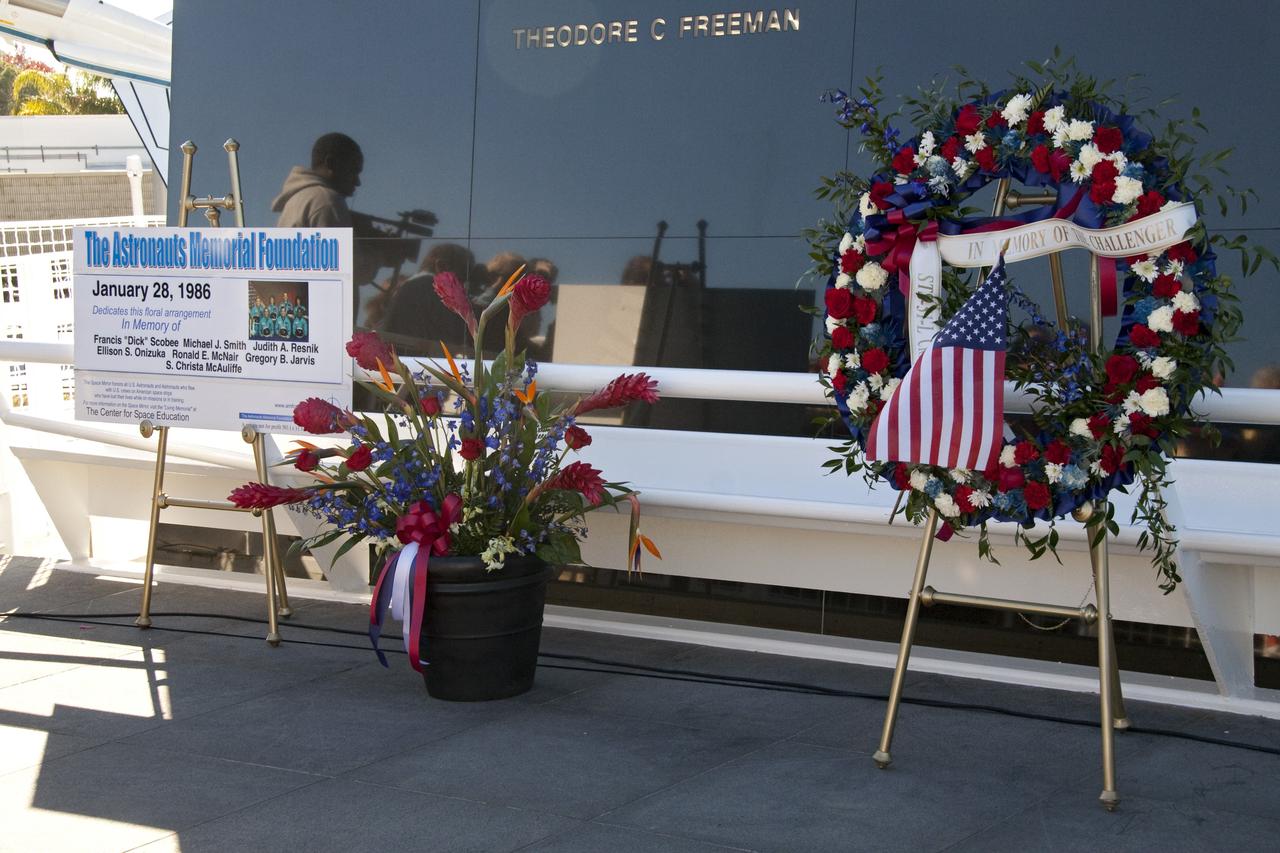 CAPE CANAVERAL, Fla. -- A wreath is displayed at the foot of the Space Mirror Memorial at the Kennedy Space Center Visitor Complex in Florida during a ceremony to honor space shuttle Challenger's STS-51L crew members who gave their lives for while furthering the cause of exploration and discovery. 2011 marks the 25th anniversary of the loss of Challenger, which broke apart over the Atlantic Ocean 73 seconds into flight on Jan. 28, 1986. NASA/Jack Pfaller