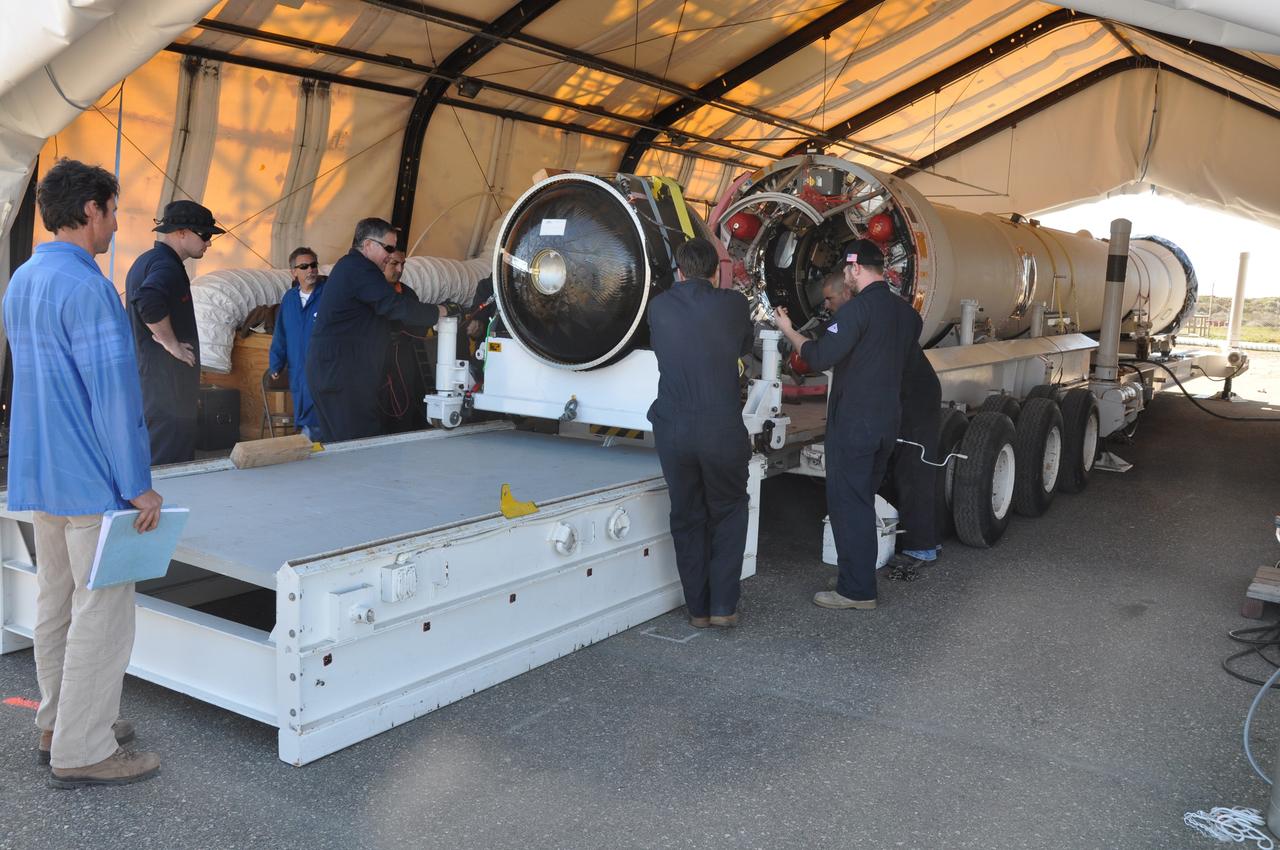 VANDENBERG AIR FORCE BASE, Calif. -- At Vandenberg Air Force Base in California, the Taurus XL rocket's Stage 3 motor is moved to a stationary rail in a temporary processing tent near the pad at Space Launch Complex 576-E. Orbital Sciences' Taurus XL is a four-stage rocket that will carry NASA's Glory spacecraft into low Earth orbit. In early February, the spacecraft is scheduled to arrive at the pad, where it will be attached to the third stage and then stacked atop the remaining stages.        Once Glory reaches orbit, it will collect data on the properties of aerosols and black carbon. It also will help scientists understand how the sun's irradiance affects Earth's climate. Launch is scheduled for 5:09 a.m. EST Feb. 23. For information, visit www.nasa.gov/glory. Photo credit: NASA/Randy Beaudoin, VAFB