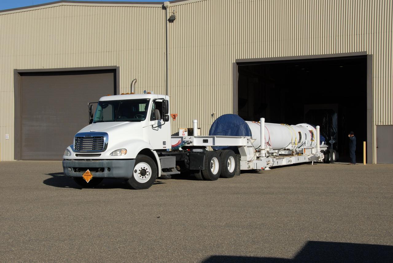 VANDENBERG AIR FORCE BASE, Calif. -- The upper vehicle stack, consisting of the first, second and third stages, of the Taurus XL rocket leaves Building 1555 for Space Launch Complex 576-E at Vandenberg Air Force Base in California. Orbital Sciences' Taurus XL is a four-stage rocket that will carry NASA's Glory spacecraft into low Earth orbit. Once Glory reaches orbit, it will collect data on the properties of aerosols and black carbon. It also will help scientists understand how the sun's irradiance affects Earth's climate. Launch is scheduled for 5:09 a.m. EST Feb. 23. For information, visit www.nasa.gov/glory. Photo credit: NASA/VAFB