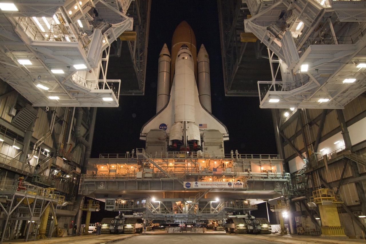 CAPE CANAVERAL, Fla. -- At NASA's Kennedy Space Center in Florida, space shuttle Discovery begins its nighttime trek, known as "rollout," from the Vehicle Assembly Building to Launch Pad 39A. It will take the shuttle, attached to its external fuel tank, twin solid rocket boosters and mobile launcher platform, about seven hours to complete the move atop a crawler-transporter. This is the second time Discovery has rolled out to the pad for the STS-133 mission, and comes after a thorough check and modifications to the shuttle's external tank. Targeted to liftoff Feb. 24, Discovery will take the Permanent Multipurpose Module (PMM) packed with supplies and critical spare parts, as well as Robonaut 2 (R2) to the International Space Station. For more information on STS-133, visit www.nasa.gov/mission_pages/shuttle/shuttlemissions/sts133/. Photo credit: NASA/Jack Pfaller