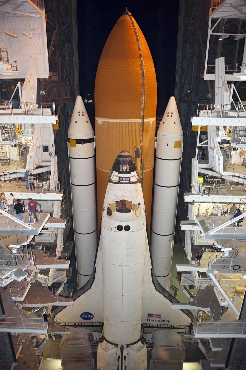 CAPE CANAVERAL, Fla. -- At NASA's Kennedy Space Center in Florida, space shuttle Discovery begins its nighttime trek, known as "rollout," from the Vehicle Assembly Building to Launch Pad 39A. It will take the shuttle, attached to its external fuel tank, twin solid rocket boosters and mobile launcher platform, about seven hours to complete the move atop a crawler-transporter. This is the second time Discovery has rolled out to the pad for the STS-133 mission, and comes after a thorough check and modifications to the shuttle's external tank. Targeted to liftoff Feb. 24, Discovery will take the Permanent Multipurpose Module (PMM) packed with supplies and critical spare parts, as well as Robonaut 2 (R2) to the International Space Station. For more information on STS-133, visit www.nasa.gov/mission_pages/shuttle/shuttlemissions/sts133/. Photo credit: NASA/Kim Shiflett
