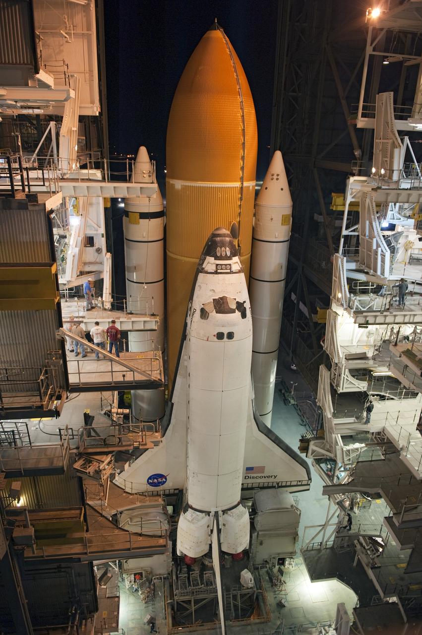 CAPE CANAVERAL, Fla. -- At NASA's Kennedy Space Center in Florida, space shuttle Discovery begins its nighttime trek, known as "rollout," from the Vehicle Assembly Building to Launch Pad 39A. It will take the shuttle, attached to its external fuel tank, twin solid rocket boosters and mobile launcher platform, about seven hours to complete the move atop a crawler-transporter. This is the second time Discovery has rolled out to the pad for the STS-133 mission, and comes after a thorough check and modifications to the shuttle's external tank. Targeted to liftoff Feb. 24, Discovery will take the Permanent Multipurpose Module (PMM) packed with supplies and critical spare parts, as well as Robonaut 2 (R2) to the International Space Station. For more information on STS-133, visit www.nasa.gov/mission_pages/shuttle/shuttlemissions/sts133/. Photo credit: NASA/Kim Shiflett