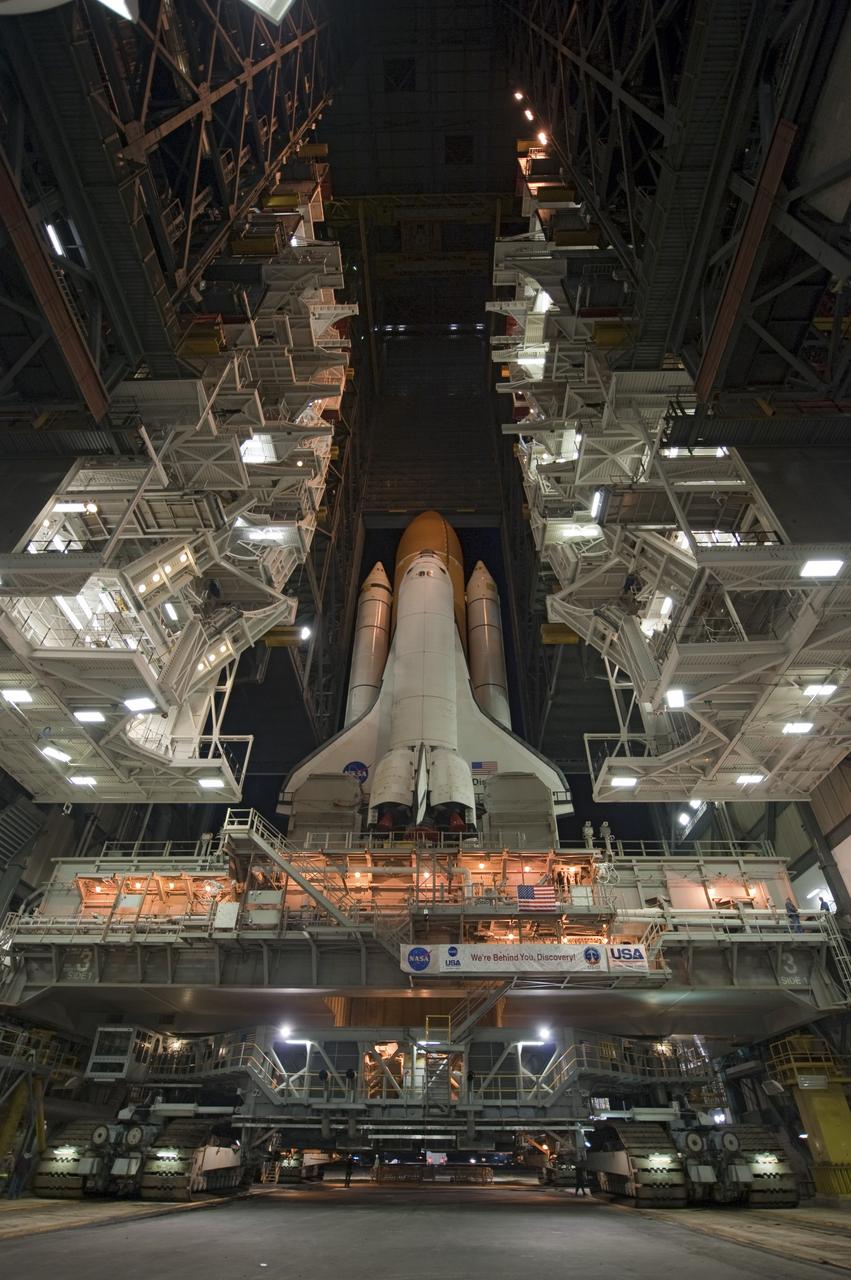 CAPE CANAVERAL, Fla. -- At NASA's Kennedy Space Center in Florida, space shuttle Discovery begins its nighttime trek, known as "rollout," from the Vehicle Assembly Building to Launch Pad 39A. It will take the shuttle, attached to its external fuel tank, twin solid rocket boosters and mobile launcher platform, about seven hours to complete the move atop a crawler-transporter. This is the second time Discovery has rolled out to the pad for the STS-133 mission, and comes after a thorough check and modifications to the shuttle's external tank. Targeted to liftoff Feb. 24, Discovery will take the Permanent Multipurpose Module (PMM) packed with supplies and critical spare parts, as well as Robonaut 2 (R2) to the International Space Station. For more information on STS-133, visit www.nasa.gov/mission_pages/shuttle/shuttlemissions/sts133/. Photo credit: NASA/Kim Shiflett