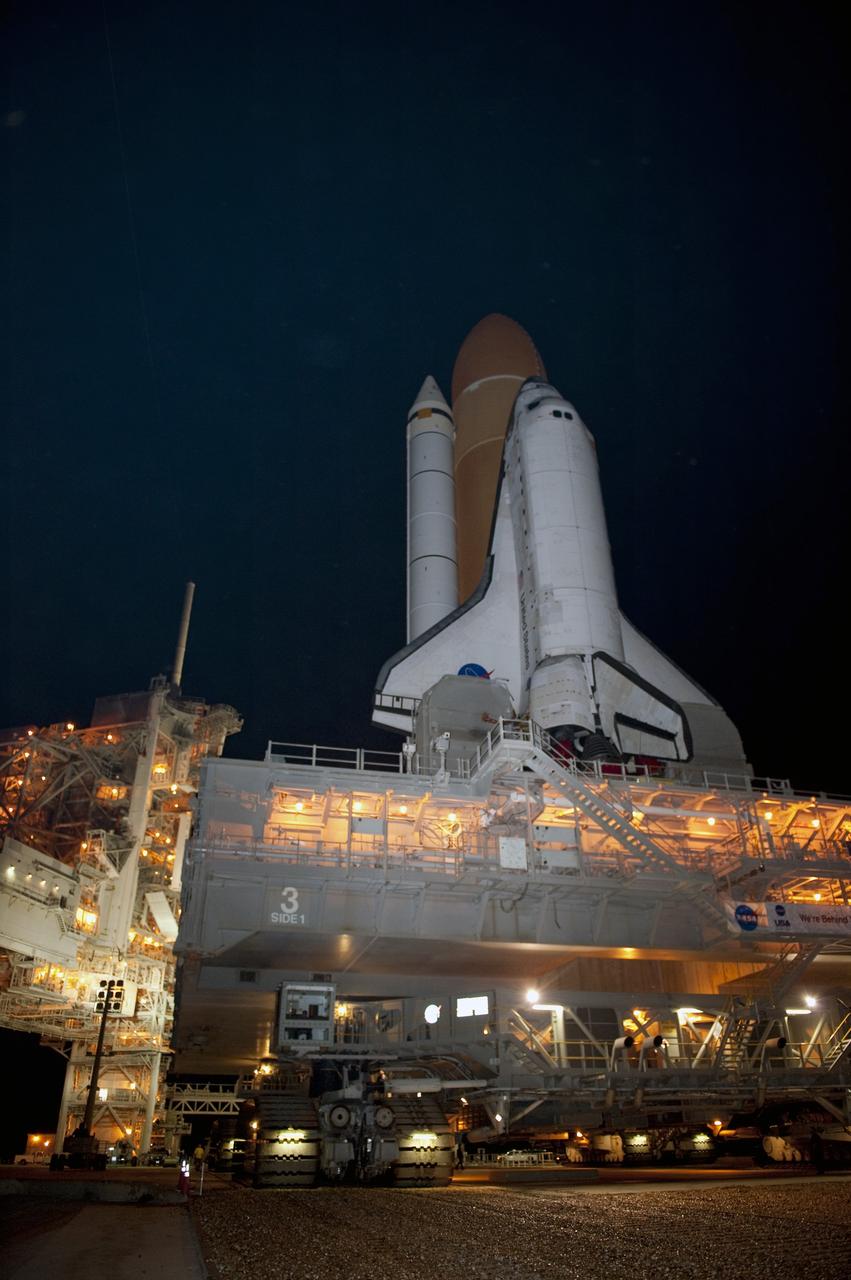 CAPE CANAVERAL, Fla. -- Space shuttle Discovery arrives at Launch Pad 39A from the Vehicle Assembly Building at NASA's Kennedy Space Center in Florida. It took the shuttle, attached to its external fuel tank, twin solid rocket boosters and mobile launcher platform, about seven hours to complete the move atop a crawler-transporter. This is the second time Discovery has rolled out to the pad for the STS-133 mission, and comes after a thorough check and modifications to the shuttle's external tank. Targeted to liftoff Feb. 24, Discovery will take the Permanent Multipurpose Module (PMM) packed with supplies and critical spare parts, as well as Robonaut 2 (R2) to the International Space Station. For more information on STS-133, visit www.nasa.gov/mission_pages/shuttle/shuttlemissions/sts133/. Photo credit: NASA/Kim Shiflett