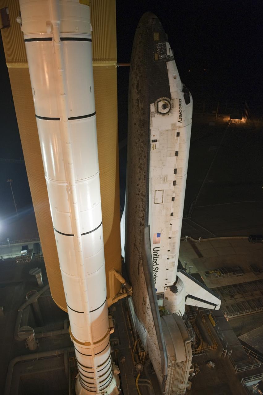 CAPE CANAVERAL, Fla. -- Space shuttle Discovery arrives at Launch Pad 39A from the Vehicle Assembly Building at NASA's Kennedy Space Center in Florida. It took the shuttle, attached to its external fuel tank, twin solid rocket boosters and mobile launcher platform, about seven hours to complete the move atop a crawler-transporter. This is the second time Discovery has rolled out to the pad for the STS-133 mission, and comes after a thorough check and modifications to the shuttle's external tank. Targeted to liftoff Feb. 24, Discovery will take the Permanent Multipurpose Module (PMM) packed with supplies and critical spare parts, as well as Robonaut 2 (R2) to the International Space Station. For more information on STS-133, visit www.nasa.gov/mission_pages/shuttle/shuttlemissions/sts133/. Photo credit: NASA/Kim Shiflett