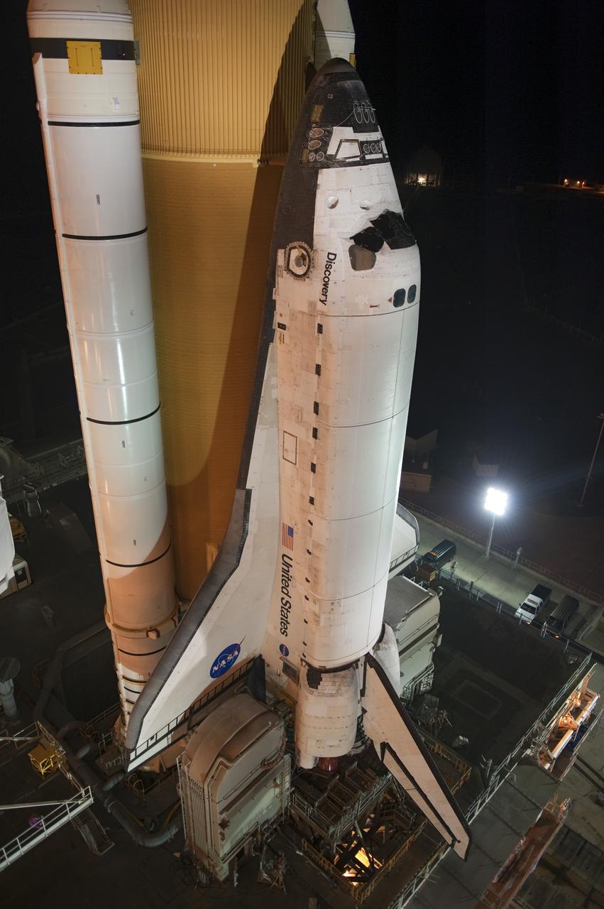 CAPE CANAVERAL, Fla. -- Space shuttle Discovery arrives at Launch Pad 39A from the Vehicle Assembly Building at NASA's Kennedy Space Center in Florida. It took the shuttle, attached to its external fuel tank, twin solid rocket boosters and mobile launcher platform, about seven hours to complete the move atop a crawler-transporter. This is the second time Discovery has rolled out to the pad for the STS-133 mission, and comes after a thorough check and modifications to the shuttle's external tank. Targeted to liftoff Feb. 24, Discovery will take the Permanent Multipurpose Module (PMM) packed with supplies and critical spare parts, as well as Robonaut 2 (R2) to the International Space Station. For more information on STS-133, visit www.nasa.gov/mission_pages/shuttle/shuttlemissions/sts133/. Photo credit: NASA/Kim Shiflett