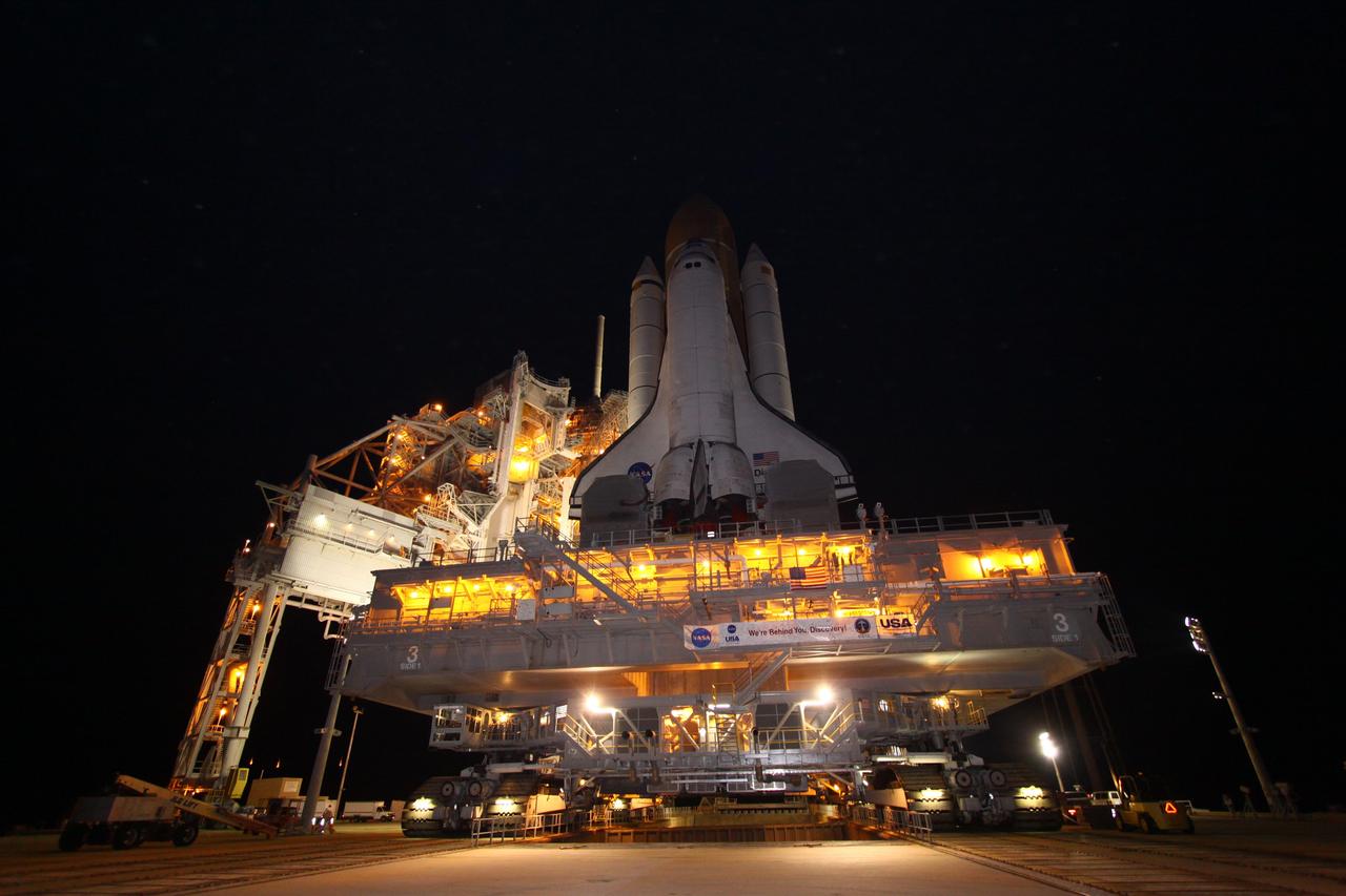 CAPE CANAVERAL, Fla. -- Space shuttle Discovery arrives at Launch Pad 39A from the Vehicle Assembly Building at NASA's Kennedy Space Center in Florida. It took the shuttle, attached to its external fuel tank, twin solid rocket boosters and mobile launcher platform, about seven hours to complete the move atop a crawler-transporter. This is the second time Discovery has rolled out to the pad for the STS-133 mission, and comes after a thorough check and modifications to the shuttle's external tank. Targeted to liftoff Feb. 24, Discovery will take the Permanent Multipurpose Module (PMM) packed with supplies and critical spare parts, as well as Robonaut 2 (R2) to the International Space Station. For more information on STS-133, visit www.nasa.gov/mission_pages/shuttle/shuttlemissions/sts133/. Photo credit: NASA/Jack Pfaller