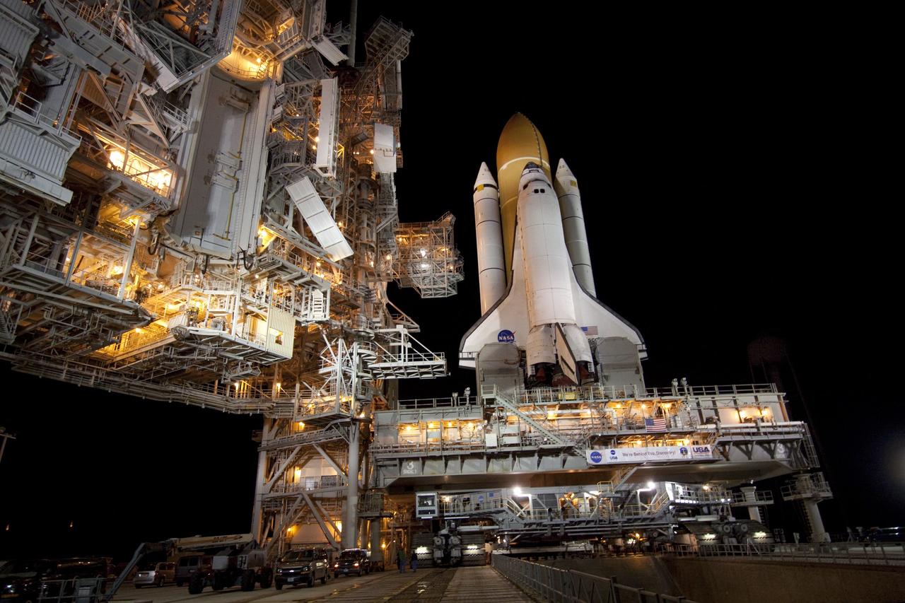 CAPE CANAVERAL, Fla. -- Space shuttle Discovery arrives at Launch Pad 39A from the Vehicle Assembly Building at NASA's Kennedy Space Center in Florida. It took the shuttle, attached to its external fuel tank, twin solid rocket boosters and mobile launcher platform, about seven hours to complete the move atop a crawler-transporter. This is the second time Discovery has rolled out to the pad for the STS-133 mission, and comes after a thorough check and modifications to the shuttle's external tank. Targeted to liftoff Feb. 24, Discovery will take the Permanent Multipurpose Module (PMM) packed with supplies and critical spare parts, as well as Robonaut 2 (R2) to the International Space Station. For more information on STS-133, visit www.nasa.gov/mission_pages/shuttle/shuttlemissions/sts133/. Photo credit: NASA/Jack Pfaller