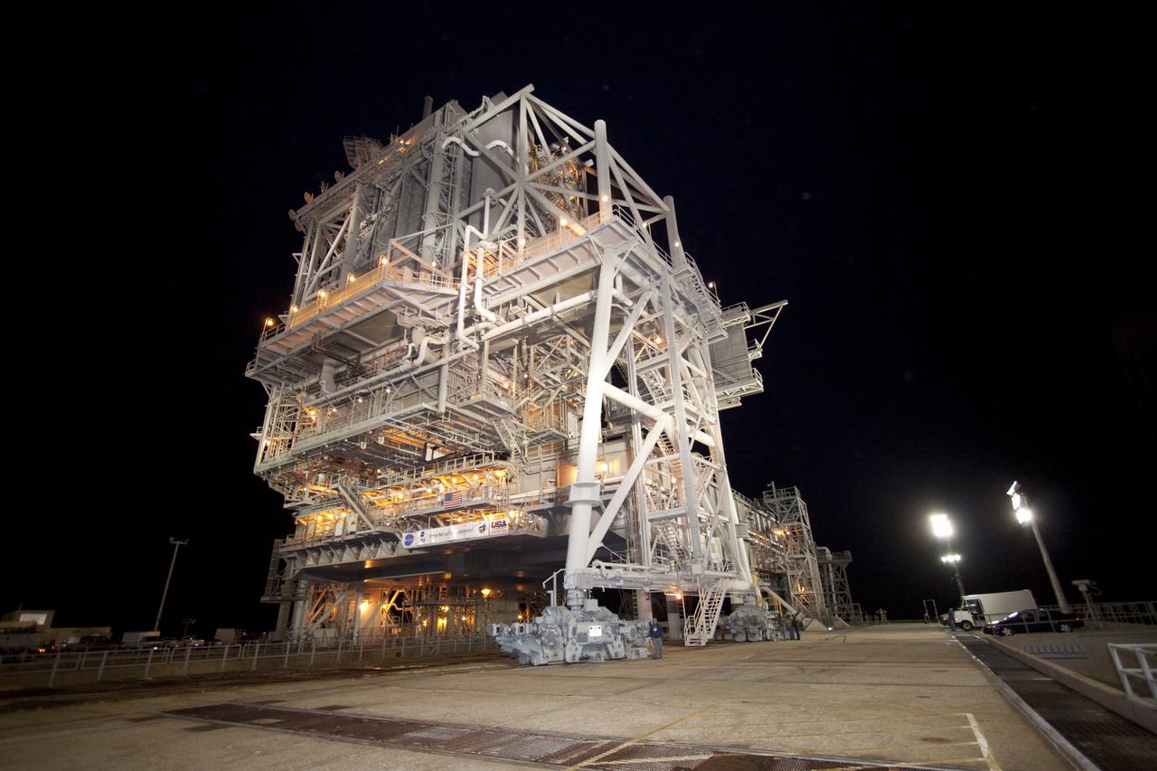 CAPE CANAVERAL, Fla. -- The rotating service structure (RSS), which provides weather protection and access to the shuttle, surrounds space shuttle Discovery on Launch Pad 39A at NASA's Kennedy Space Center in Florida. This comes after Discovery, attached to its external fuel tank, twin solid rocket boosters and mobile launcher platform, rolled out to the pad from the Vehicle Assembly Building during the overnight hours. Rollout to the pad is a significant shuttle processing milestone for the upcoming STS-133 mission, and comes after a thorough check and modifications to the shuttle's external fuel tank. Targeted to liftoff Feb. 24, Discovery will take the Permanent Multipurpose Module (PMM) packed with supplies and critical spare parts, as well as Robonaut 2 (R2) to the International Space Station. For more information on STS-133, visit www.nasa.gov/mission_pages/shuttle/shuttlemissions/sts133/. Photo credit: NASA/Jack Pfaller