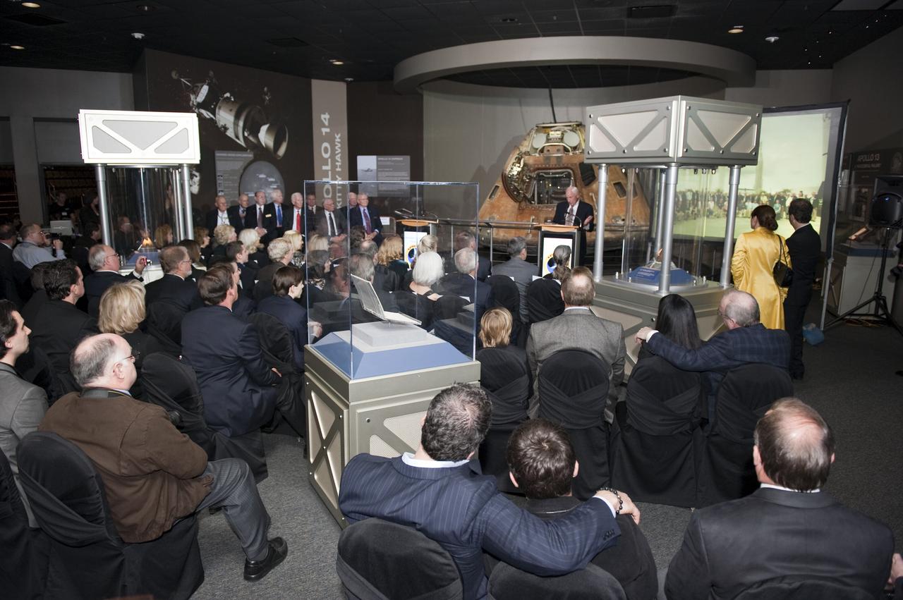CAPE CANAVERAL, Fla. -- Command module pilot for Apollo 15 Al Worden talks to attendees of the Apollo 14 Anniversary Soirée at the Kennedy Space Center Visitor Complex's Saturn V Center. The celebration was hosted by the Astronaut Scholarship Foundation. Apollo 14 landed on the lunar surface 40 years ago on Feb. 5, 1971. Photo credit: NASA/Kim Shiflett