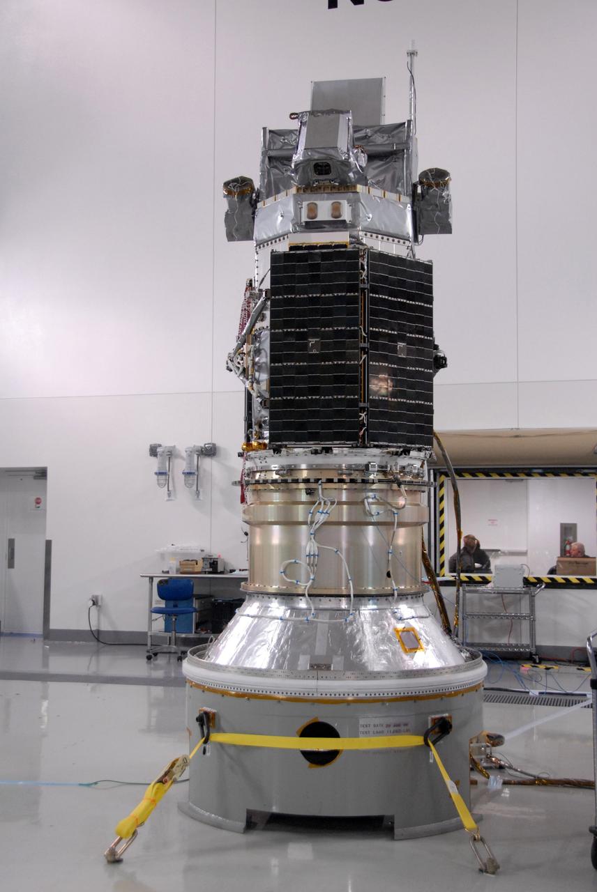 VANDENBERG AIR FORCE BASE, Calif. -- Inside the Astrotech payload processing facility at Vandenberg Air Force Base in California, NASA's Glory spacecraft  is revealed after technicians removed the protective covering surrounding it. Next, the spacecraft will be encapsulated in its protective payload fairing before it is transported to Space Launch Complex 576-E and joined with the Taurus XL rocket's third stage.            The Orbital Sciences Corp. Taurus XL rocket will carry Glory into low Earth orbit. Once the spacecraft reaches orbit, it will collect data on the properties of aerosols and black carbon. It also will help scientists understand how the sun's irradiance affects Earth's climate. Launch is scheduled for 5:09 a.m. EST Feb. 23. For information, visit www.nasa.gov/glory. Photo credit: NASA/Don Kososka, VAFB