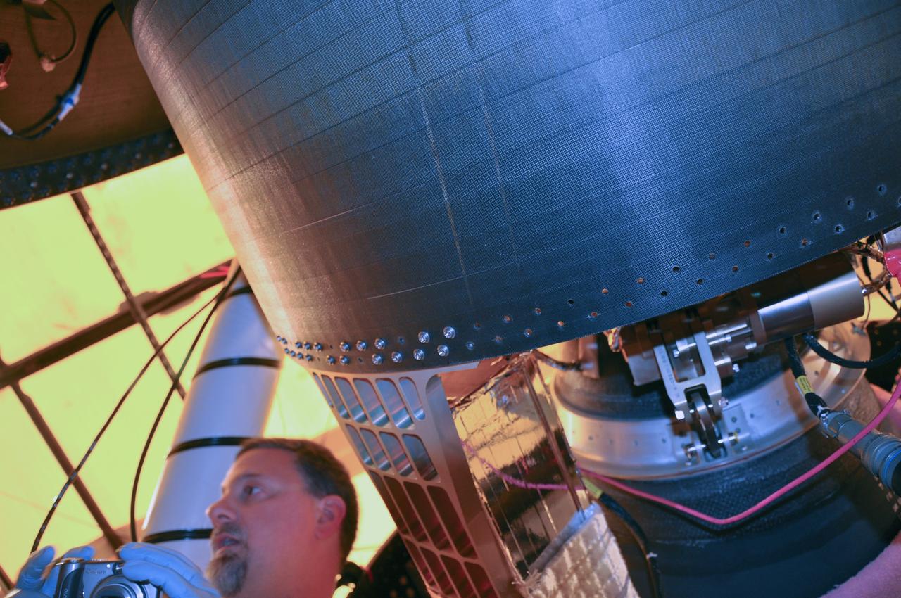 VANDENBERG AIR FORCE BASE, Calif. -- At Space Launch Complex 576-E at Vandenberg Air Force Base in California, the Poly Picosatellite Orbital Deployer, or P-POD, assembly has been installed to the aft end of the Taurus rocket's third stage using the Anodized gold aluminum bracket interface. The P-POD holds three CubeSats or tiny satellites, designed and created by university and college students that will be carried on the Taurus rocket along with the Glory spacecraft.               The Orbital Sciences Corp. Taurus XL rocket will carry Glory into low Earth orbit. Once Glory reaches orbit, it will collect data on the properties of aerosols and black carbon. It also will help scientists understand how the sun's irradiance affects Earth's climate. Launch is scheduled for 5:09 a.m. EST Feb. 23. For information, visit www.nasa.gov/glory. Photo credit: NASA/Randy Beaudoin, VAFB