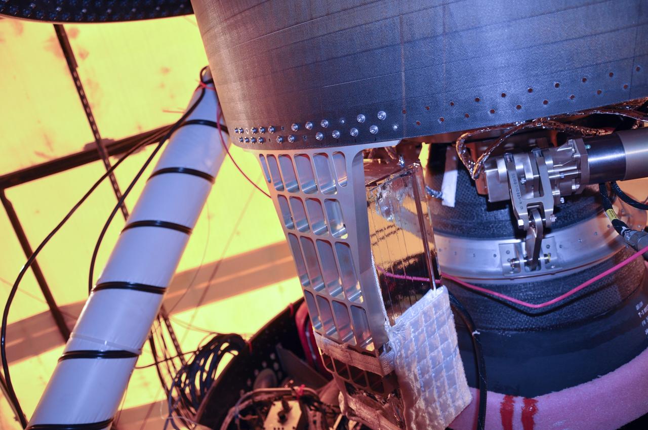 VANDENBERG AIR FORCE BASE, Calif. -- At Space Launch Complex 576-E at Vandenberg Air Force Base in California, the Poly Picosatellite Orbital Deployer, or P-POD, assembly has been installed to the aft end of the Taurus rocket's third stage using the Anodized gold aluminum bracket interface. The P-POD holds three CubeSats or tiny satellites, designed and created by university and college students that will be carried on the Taurus rocket along with the Glory spacecraft.               The Orbital Sciences Corp. Taurus XL rocket will carry Glory into low Earth orbit. Once Glory reaches orbit, it will collect data on the properties of aerosols and black carbon. It also will help scientists understand how the sun's irradiance affects Earth's climate. Launch is scheduled for 5:09 a.m. EST Feb. 23. For information, visit www.nasa.gov/glory. Photo credit: NASA/Randy Beaudoin, VAFB