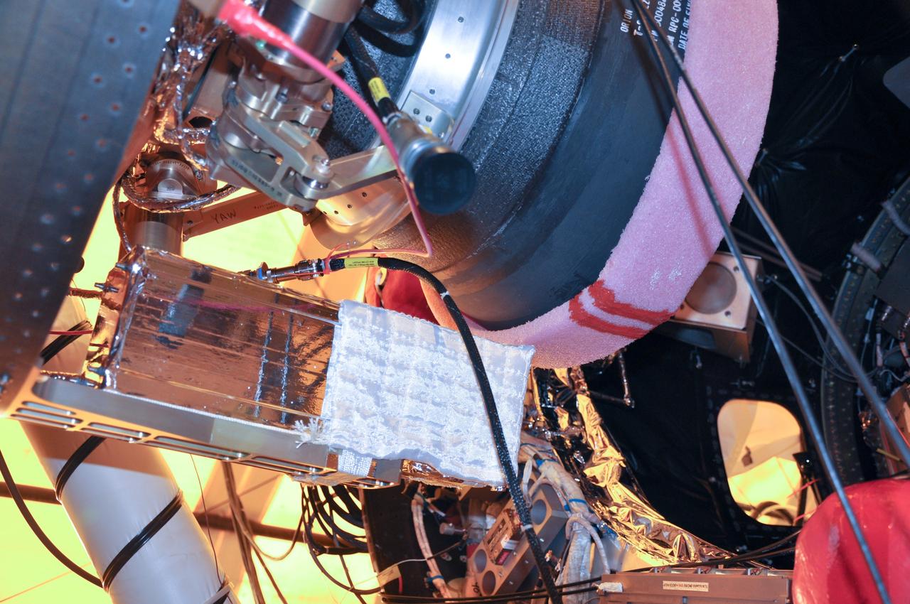 VANDENBERG AIR FORCE BASE, Calif. -- At Space Launch Complex 576-E at Vandenberg Air Force Base in California, the Poly Picosatellite Orbital Deployer, or P-POD, assembly has been installed to the aft end of the Taurus rocket's third stage using the Anodized gold aluminum bracket interface. The P-POD holds three CubeSats or tiny satellites, designed and created by university and college students that will be carried on the Taurus rocket along with the Glory spacecraft.               The Orbital Sciences Corp. Taurus XL rocket will carry Glory into low Earth orbit. Once Glory reaches orbit, it will collect data on the properties of aerosols and black carbon. It also will help scientists understand how the sun's irradiance affects Earth's climate. Launch is scheduled for 5:09 a.m. EST Feb. 23. For information, visit www.nasa.gov/glory. Photo credit: NASA/Randy Beaudoin, VAFB