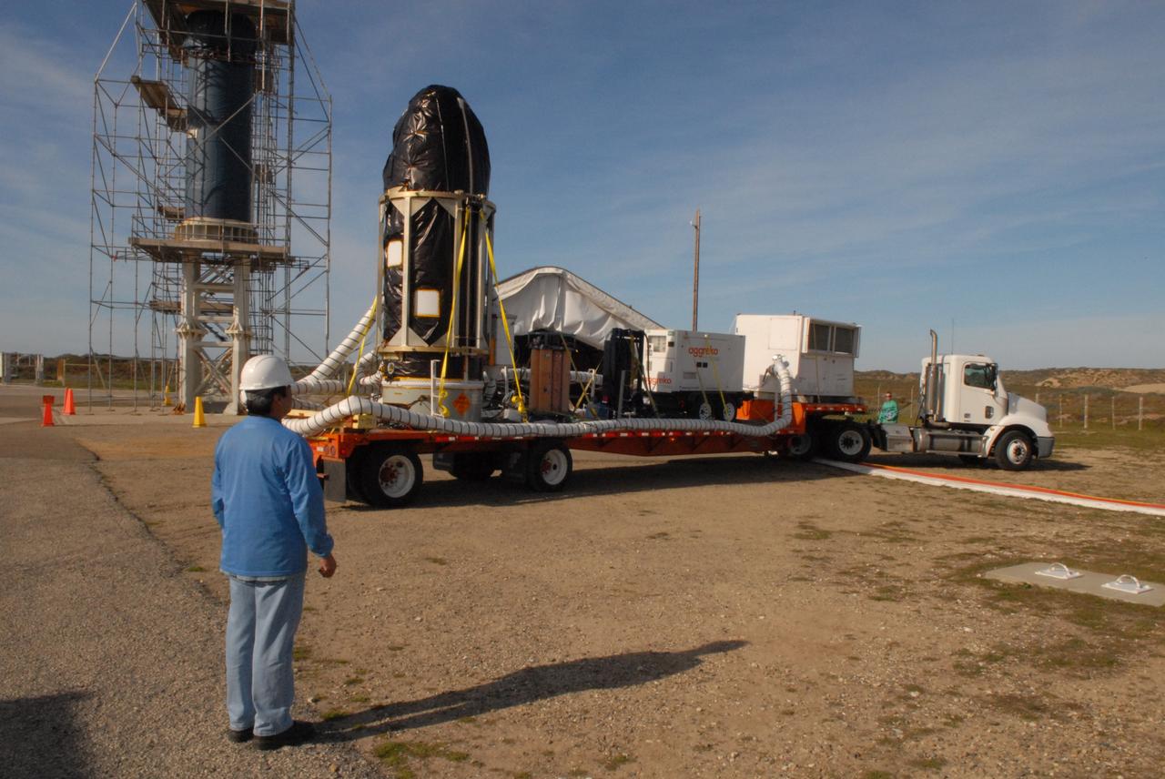 VANDENBERG AIR FORCE BASE, Calif. -- At Vandenberg Air Force Base in California, NASA's Glory spacecraft, encapsulated in its protective fairing, arrives at Space Launch Complex 576-E. There it will be joined with the Taurus XL rocket's third stage, already delivered to a temporary processing tent near the pad. The Orbital Sciences Corp. Taurus XL rocket will carry Glory into low Earth orbit.             Once Glory reaches orbit, it will collect data on the properties of aerosols and black carbon. It also will help scientists understand how the sun's irradiance affects Earth's climate. Launch is scheduled for 5:09 a.m. EST Feb. 23. For information, visit www.nasa.gov/glory. Photo credit: NASA/Jerry E. Clemens Jr., VAFB