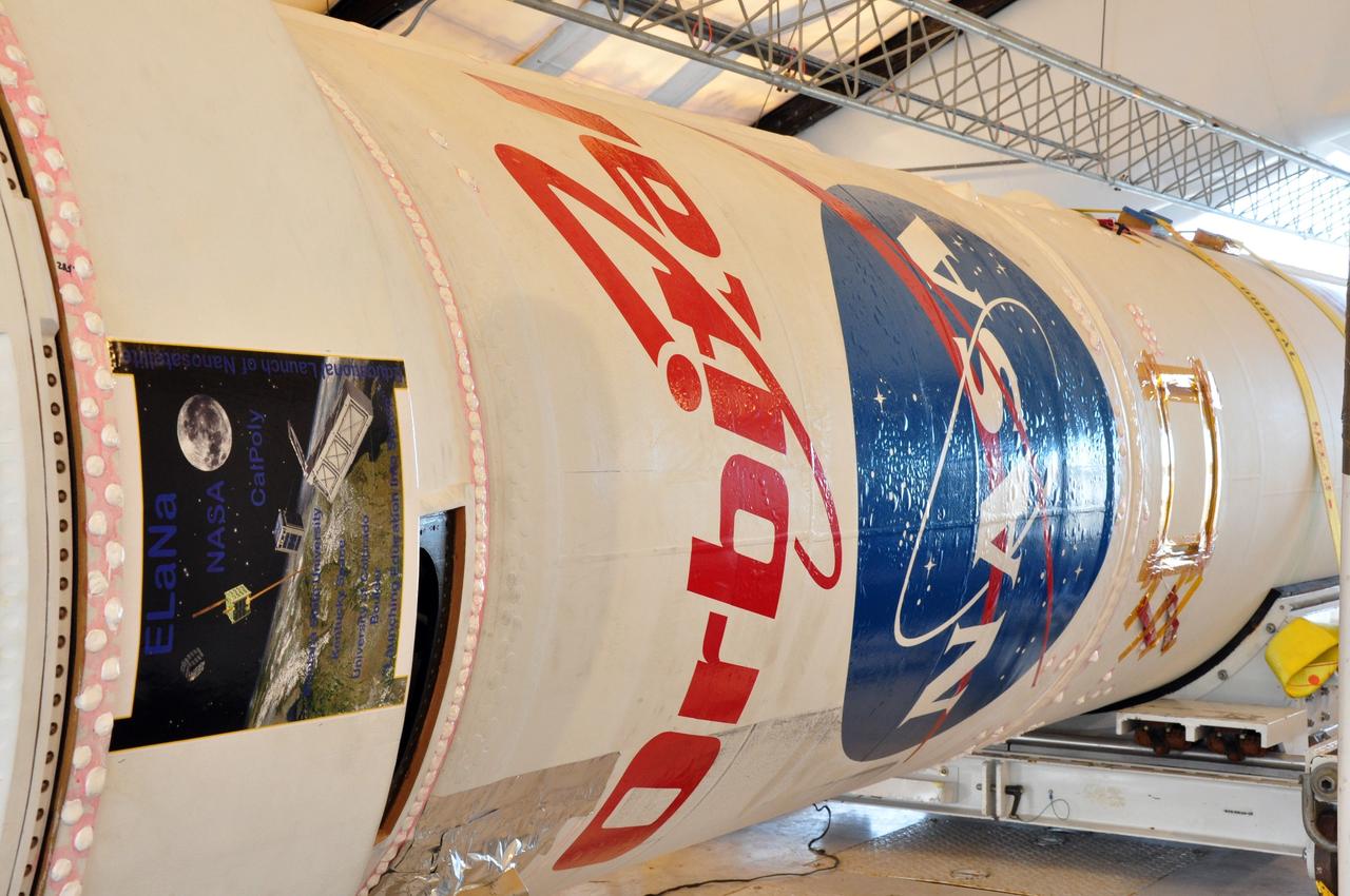 VANDENBERG AIR FORCE BASE, Calif. -- At Space Launch Complex 576-E at Vandenberg Air Force Base in California, NASA's Glory spacecraft already integrated with the upper stack of the Taurus rocket displays the mission decals.        The Orbital Sciences Corp. Taurus XL rocket will launch Glory into low Earth orbit. Once Glory reaches orbit, it will collect data on the properties of aerosols and black carbon. It also will help scientists understand how the sun's irradiance affects Earth's climate. Launch is scheduled for 5:09 a.m. EST Feb. 23. For information, visit www.nasa.gov/glory. Photo credit: NASA/Randy Beaudoin, VAFB