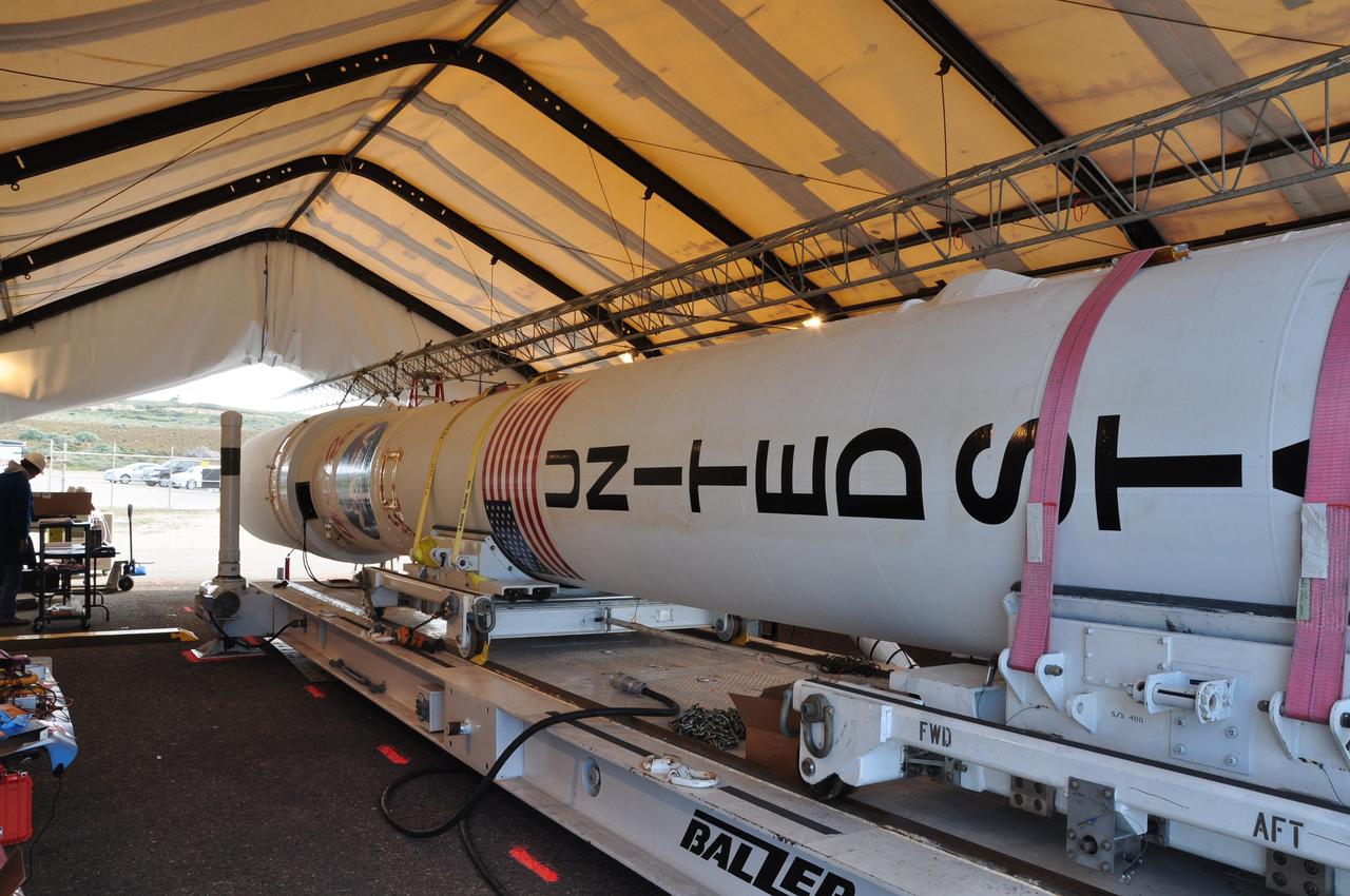 VANDENBERG AIR FORCE BASE, Calif. -- At Space Launch Complex 576-E at Vandenberg Air Force Base in California, the upper umbilical tower has been joined to NASA's Glory spacecraft, already integrated with the upper stack of the Taurus rocket. During liftoff this tower falls away from the spacecraft.      The Orbital Sciences Corp. Taurus XL rocket will launch Glory into low Earth orbit. Once Glory reaches orbit, it will collect data on the properties of aerosols and black carbon. It also will help scientists understand how the sun's irradiance affects Earth's climate. Launch is scheduled for 5:09 a.m. EST Feb. 23. For information, visit www.nasa.gov/glory. Photo credit: NASA/Randy Beaudoin, VAFB