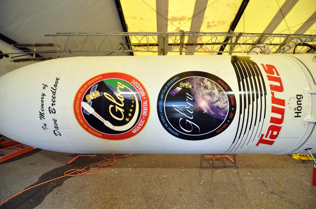 VANDENBERG AIR FORCE BASE, Calif. -- At Space Launch Complex 576-E at Vandenberg Air Force Base in California, NASA's Glory spacecraft, integrated with the upper stack of the Taurus rocket, displays mission decals including one in remembrance of Dave Breedlove who was a mission manager and long-time member of the Launch Services Program team. The vehicle is dedicated to his memory.          The Orbital Sciences Corp. Taurus XL rocket will launch Glory into low Earth orbit. Once Glory reaches orbit, it will collect data on the properties of aerosols and black carbon. It also will help scientists understand how the sun's irradiance affects Earth's climate. Launch is scheduled for 5:09 a.m. EST Feb. 23. For information, visit www.nasa.gov/glory. Photo credit: NASA/Randy Beaudoin, VAFB