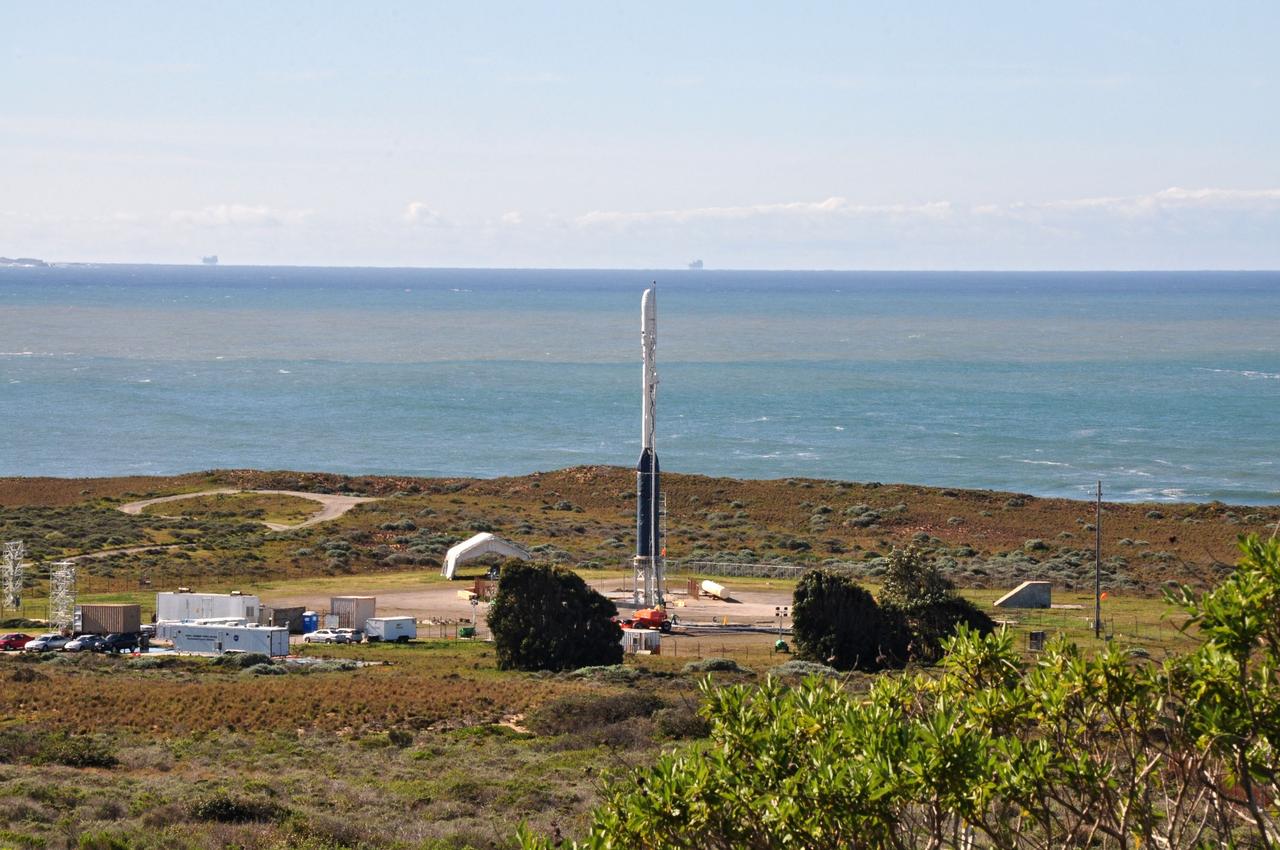 VANDENBERG AIR FORCE BASE, Calif. -- On Space Launch Complex 576-E at Vandenberg Air Force Base in California, the Taurus XL rocket is in its launch configuration. The upper stack, consisting of Stages 1, 2 and 3, as well as the encapsulated Glory spacecraft, is attached to an interstage and Stage 0 at the launch pad.           The Orbital Sciences Taurus XL rocket will launch Glory into low Earth orbit. Once Glory reaches orbit, it will collect data on the properties of aerosols and black carbon. It also will help scientists understand how the sun's irradiance affects Earth's climate. Launch is scheduled for 5:09 a.m. EST Feb. 23. For information, visit www.nasa.gov/glory. Photo credit: NASA/Randy Beaudoin, VAFB