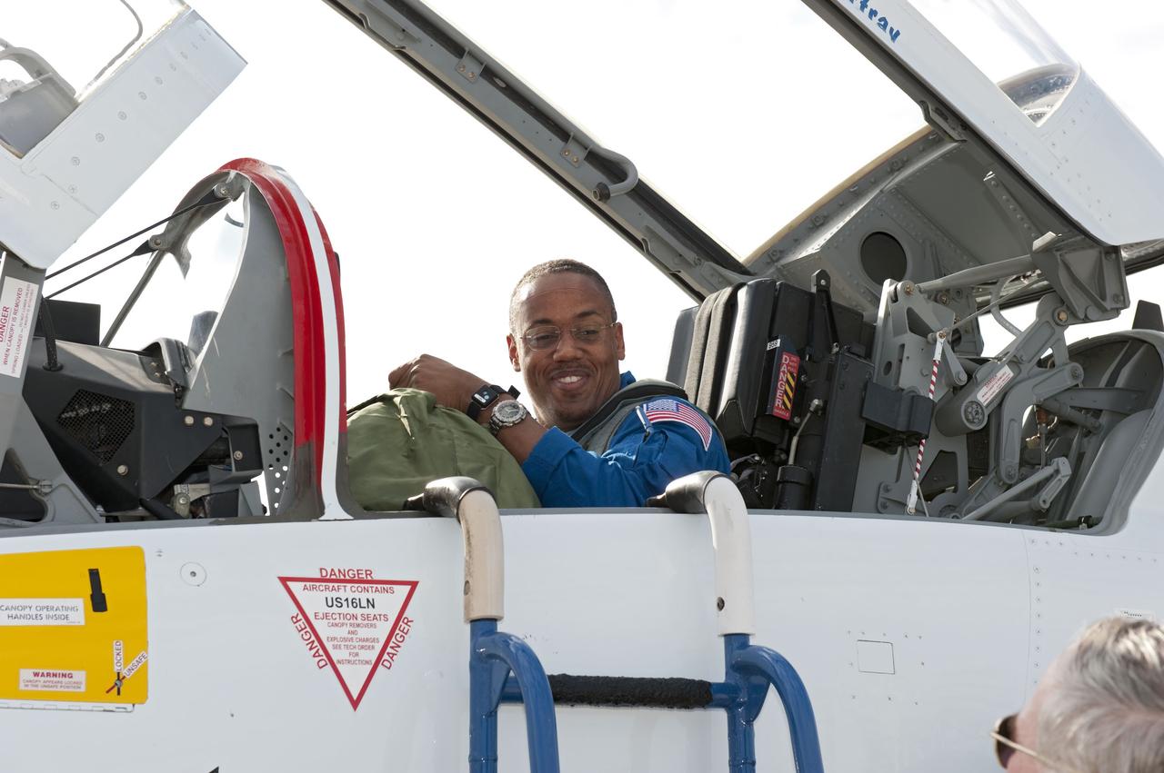 CAPE CANAVERAL, Fla. -- At NASA's Kennedy Space Center in Florida, space shuttle Discovery's STS-133 Mission Specialist Alvin Drew arrives on the Shuttle Landing Facility runway aboard a T-38 jet. In the days leading up to their launch to the International Space Station, Drew and his crew members will check the fit of their launch-and-entry suits, review launch-day procedures, receive weather briefings and remain medically quarantined to prevent sickness. This will be the second launch attempt for Discovery's crew, following a scrub in November 2010 due to a hydrogen gas leak at the ground umbilical carrier plate (GUCP) as well as modifications to the external fuel tank's intertank support beams, called stringers. Scheduled to lift off Feb. 24 at 4:50 p.m. EST, Discovery and its crew will deliver the Permanent Multipurpose Module, packed with supplies and critical spare parts, as well as Robonaut 2, the dexterous humanoid astronaut helper, to the orbiting outpost. For more information on the STS-133 mission, visit www.nasa.gov/mission_pages/shuttle/shuttlemissions/sts133/. Photo credit: NASA/Kim Shiflett