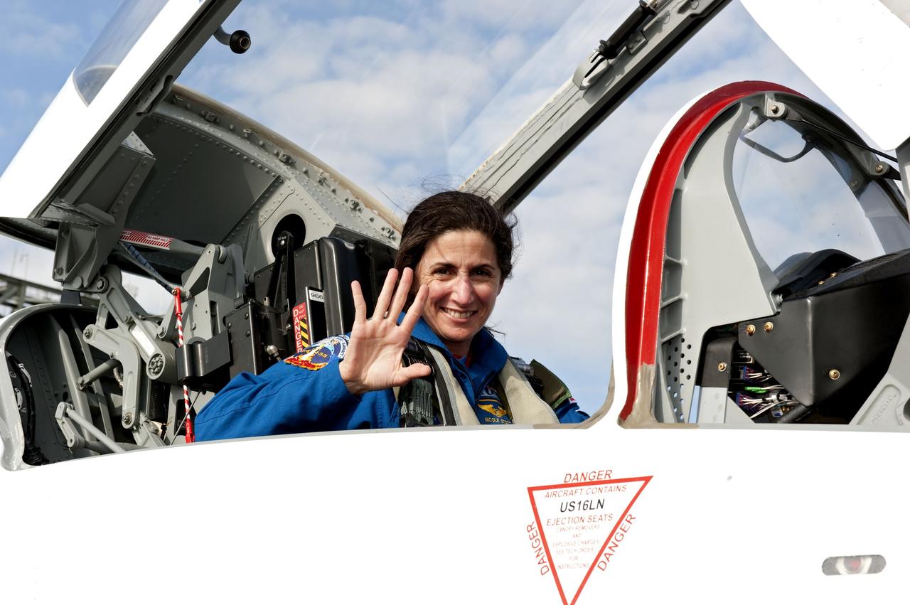 CAPE CANAVERAL, Fla. -- At NASA's Kennedy Space Center in Florida, space shuttle Discovery's STS-133 Mission Specialist Nicole Stott arrives on the Shuttle Landing Facility runway aboard a T-38 jet. In the days leading up to their launch to the International Space Station, Stott and her crew members will check the fit of their launch-and-entry suits, review launch-day procedures, receive weather briefings and remain medically quarantined to prevent sickness. This will be the second launch attempt for Discovery's crew, following a scrub in November 2010 due to a hydrogen gas leak at the ground umbilical carrier plate (GUCP) as well as modifications to the external fuel tank's intertank support beams, called stringers. Scheduled to lift off Feb. 24 at 4:50 p.m. EST, Discovery and its crew will deliver the Permanent Multipurpose Module, packed with supplies and critical spare parts, as well as Robonaut 2, the dexterous humanoid astronaut helper, to the orbiting outpost. For more information on the STS-133 mission, visit www.nasa.gov/mission_pages/shuttle/shuttlemissions/sts133/. Photo credit: NASA/Kim Shiflett