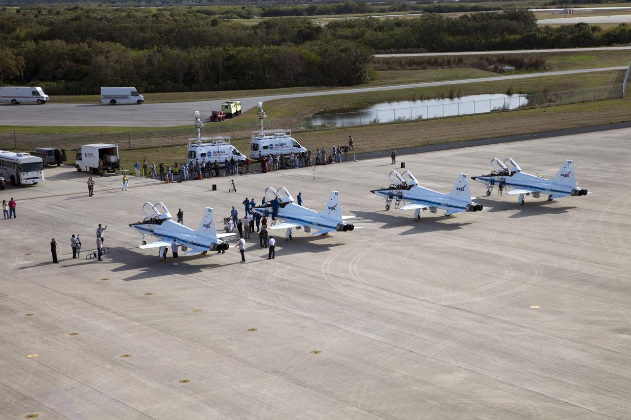 CAPE CANAVERAL, Fla. -- Space shuttle Discovery's STS-133 crew arrived on the Shuttle Landing Facility runway at NASA's Kennedy Space Center in Florida aboard four T-38 jets. In the days leading up to their launch to the International Space Station, the crew members will check the fit of their launch-and-entry suits, review launch-day procedures, receive weather briefings and remain medically quarantined to prevent sickness. This will be the second launch attempt for Discovery's crew, following a scrub in November 2010 due to a hydrogen gas leak at the ground umbilical carrier plate (GUCP) as well as modifications to the external fuel tank's intertank support beams, called stringers. Scheduled to lift off Feb. 24 at 4:50 p.m. EST, Discovery and its crew will deliver the Permanent Multipurpose Module, packed with supplies and critical spare parts, as well as Robonaut 2, the dexterous humanoid astronaut helper, to the orbiting outpost. For more information on the STS-133 mission, visit www.nasa.gov/mission_pages/shuttle/shuttlemissions/sts133/. Photo credit: NASAFrank Michaux