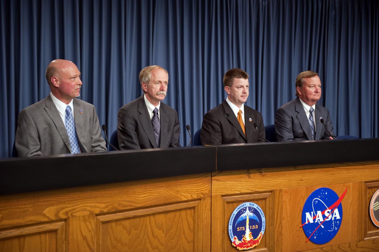 CAPE CANAVERAL, Fla. -- At NASA's Kennedy Space Center in Florida, NASA Public Affairs Officer Michael Curie, left, Associate Administrator for Space Operations Bill Gerstenmaier, Space Shuttle Program Launch Integration Manager Mike Moses and Shuttle Launch Director Mike Leinbach talk to media following a Flight Readiness Review that gave a unanimous "go" to launch space shuttle Discovery on the STS-133 mission to the International Space Station. This will be the second launch attempt for Discovery, following a scrub in November 2010 due to a hydrogen gas leak at the ground umbilical carrier plate (GUCP) as well as modifications to the external fuel tank's intertank support beams, called stringers.        Scheduled to lift off Feb. 24 at 4:50 p.m. EST, Discovery and its six-member crew will deliver the Permanent Multipurpose Module, packed with supplies and critical spare parts, as well as Robonaut 2, the dexterous humanoid astronaut helper, to the orbiting outpost. For more information on the STS-133 mission, visit www.nasa.gov/mission_pages/shuttle/shuttlemissions/sts133/.  Photo credit: NASA/Kim Shiflett